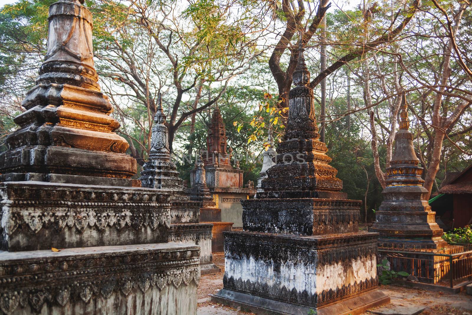 Early morning in Angkor Wat. Architecture background with stone carved towers. UNESCO World Heritage Site. Siem Reap, Cambodia.