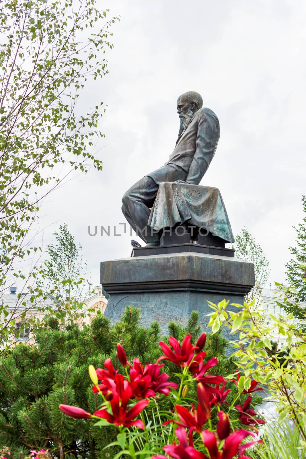 Monument to famous russian writer Dostoevsky F.M. in front of Russian State Library. Moscow, Russia.