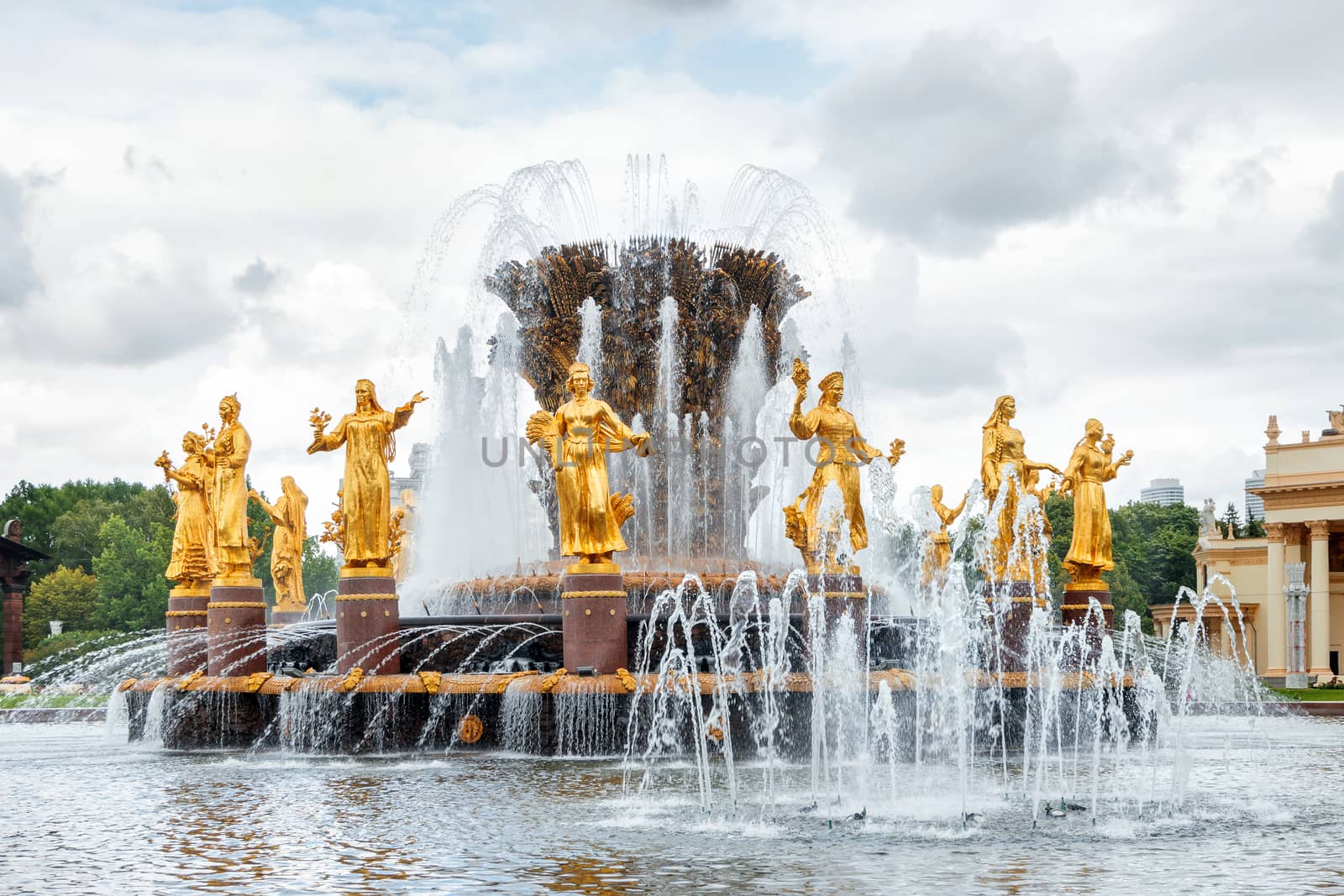 Fountain "Friendship of the people" at VDNH ("The Exhibition of achievements of national economy") in Moscow, Russia. Golden statues of women represent republics in the USSR.