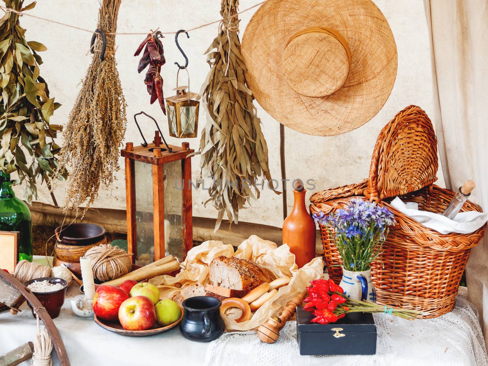 Old fashioned household items in markitant tent, historical reconstruction of 19th century. Festival Times and Epochs. Moscow, Russia.