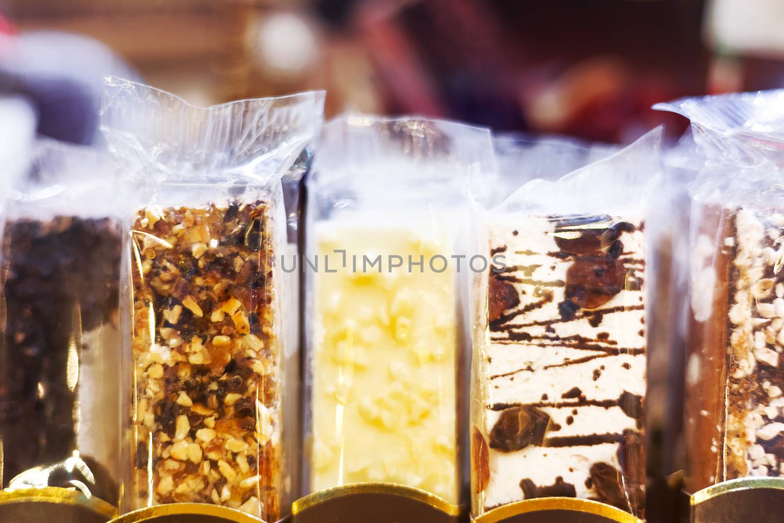 Chocolate bars with nuts and dried fruits.