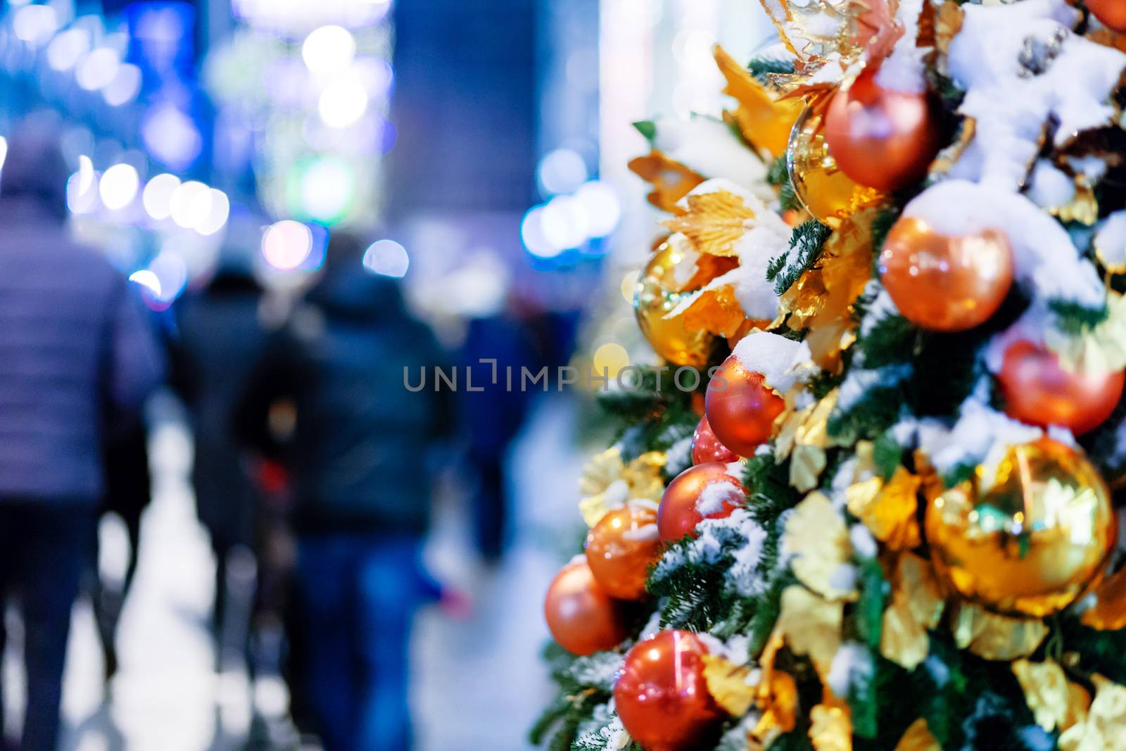Outdoor decorations for New Year and Christmas celebration. Streets of Moscow decorated with light bulbs and colorful shiny balls. Russia.