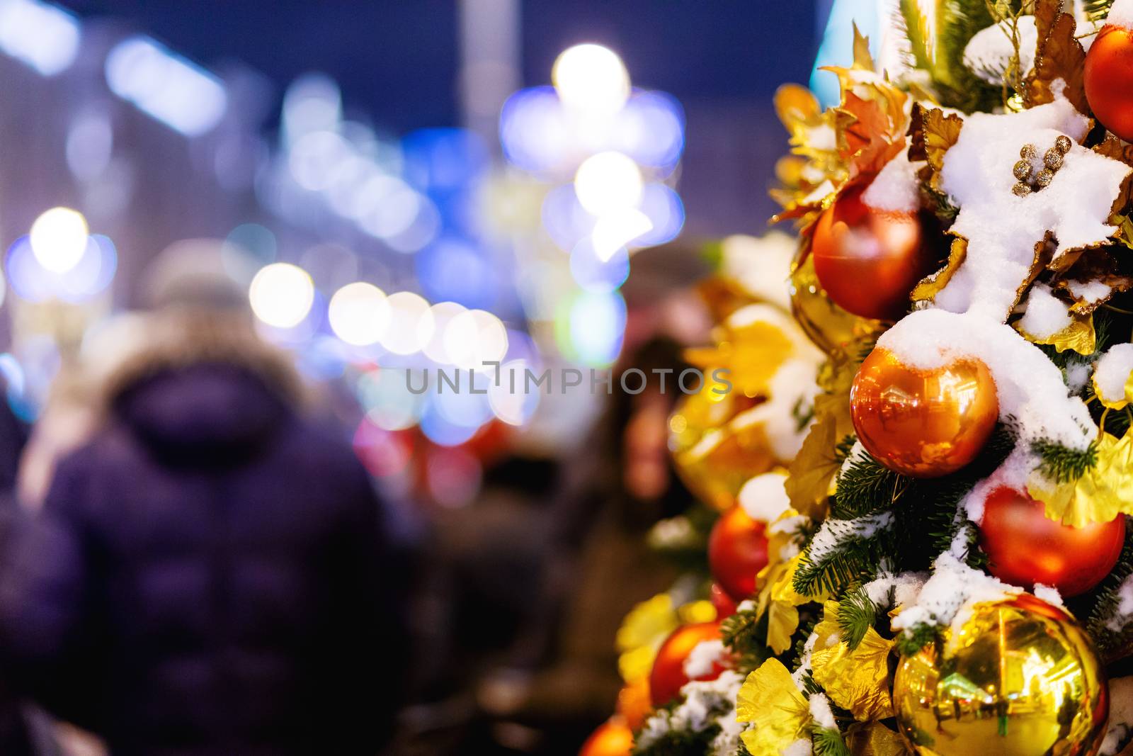 Outdoor decorations for New Year and Christmas celebration. Streets of Moscow decorated with light bulbs and colorful shiny balls. Russia.