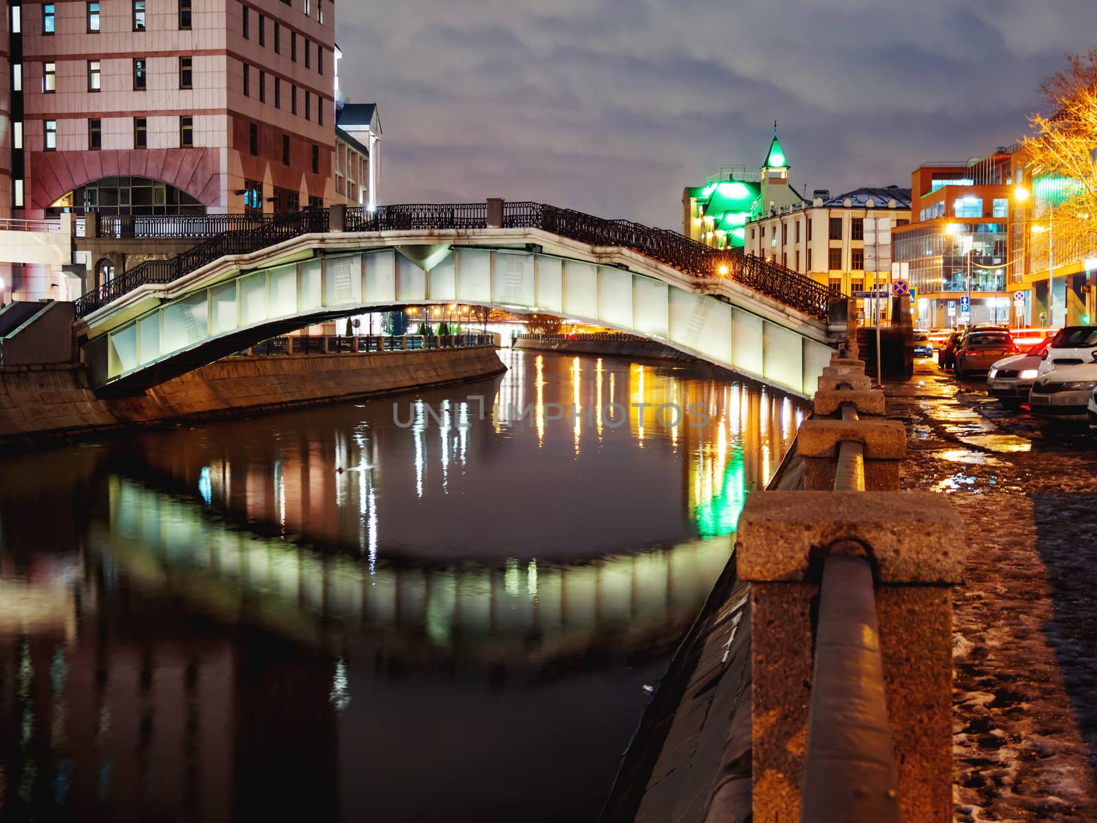 Gateway pedestrian bridge over Moscow-river. Night view on bridge between Kosmodamianskaya and Shluzovaya embankment. Moscow, Russia.