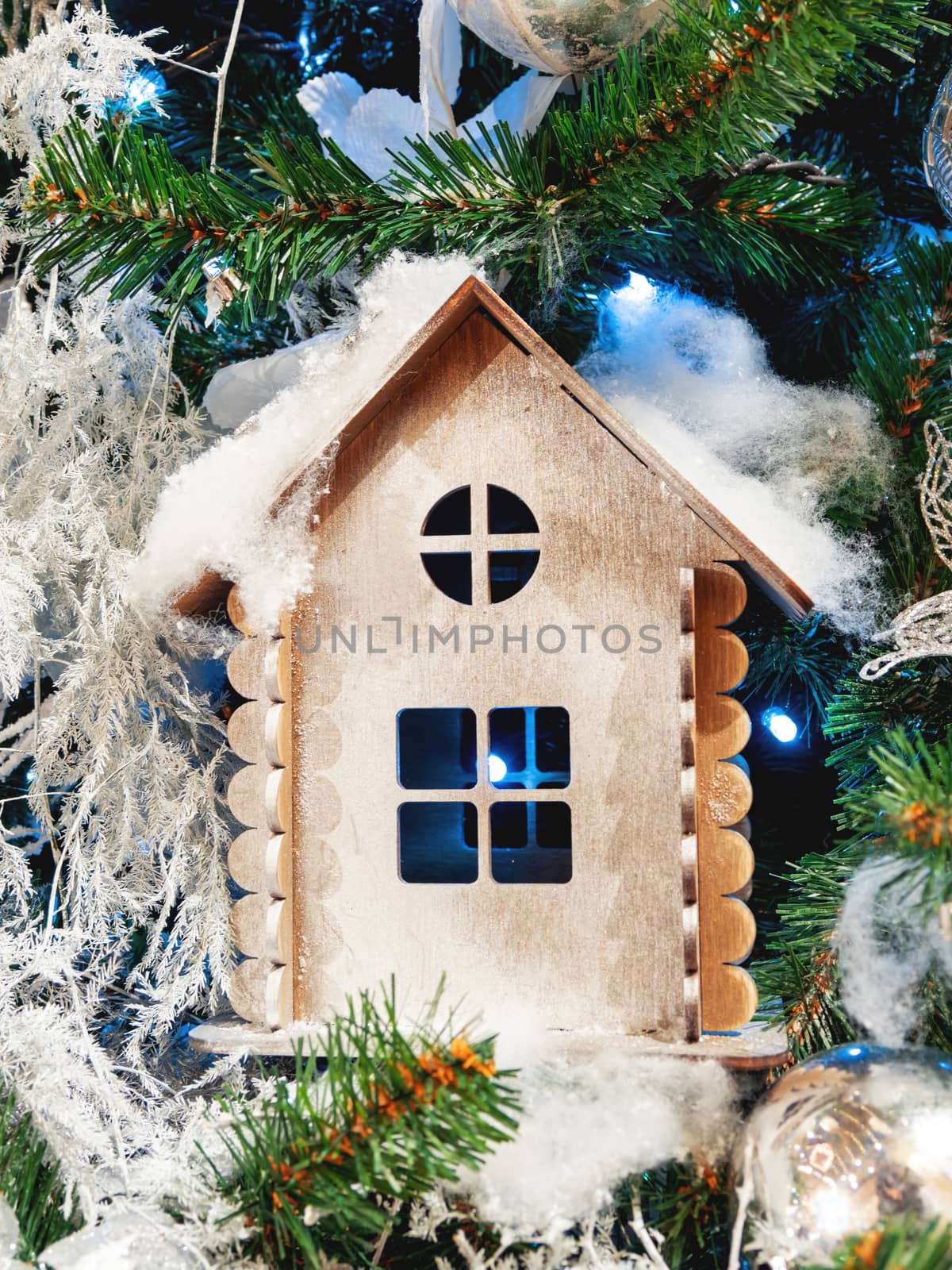 Little wooden house, decoration for Christmas tree. Traditional decoration for New Year celebration. by aksenovko