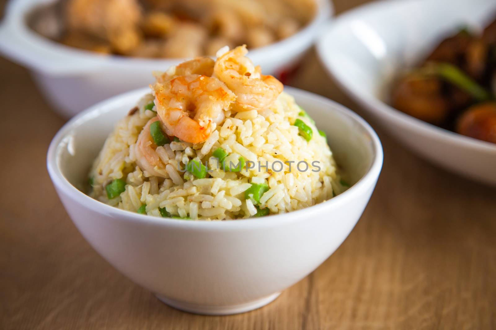 shrimp fried rice on wooden background