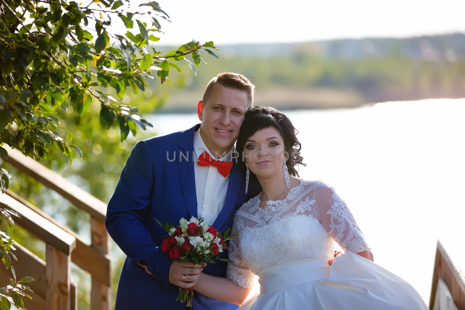 Portrait of the bride and groom in nature.