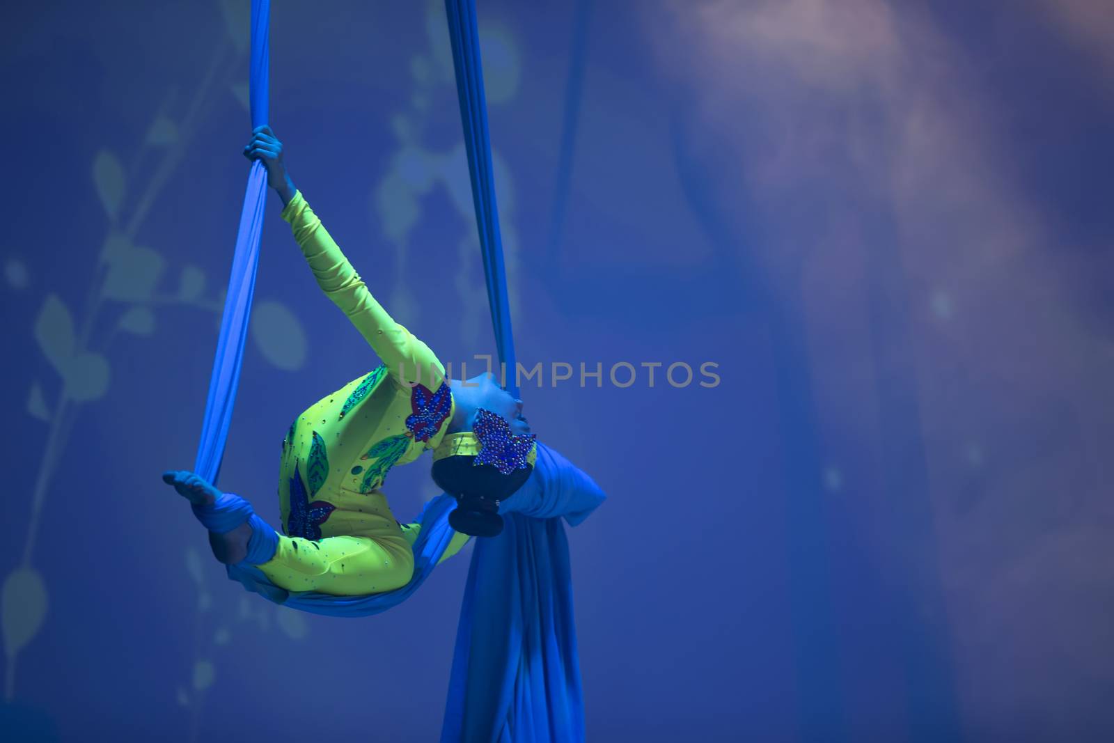 Belarus, Gomel, June 13, 2017 Palace of Culture, performance of the Abel Folk Circus,A girl dancing a dance on canvases.Children's sports. Girl gymnast. Straight tricks