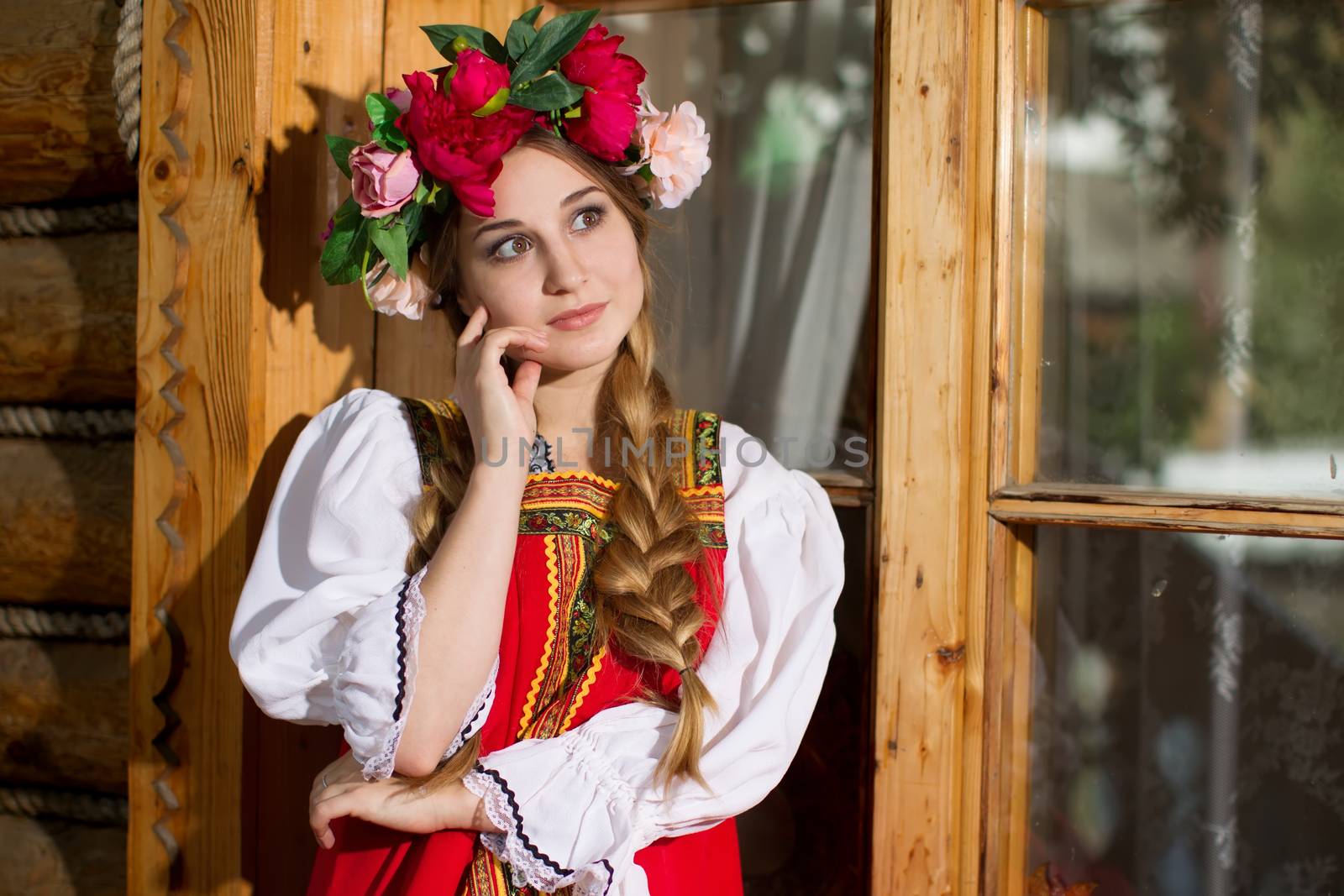 Beautiful woman portrait in russian style. Beautiful Russian girl in traditional dress. Russian style. by Sviatlana