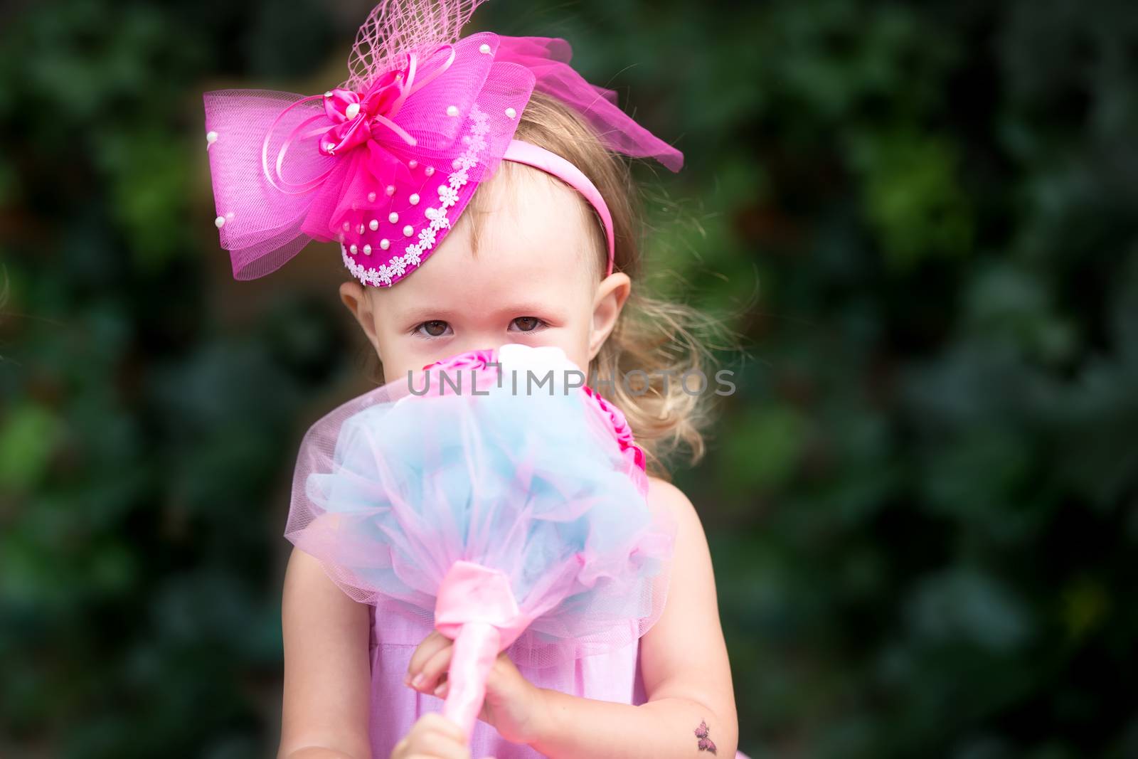 Little girl with a wedding bouquet