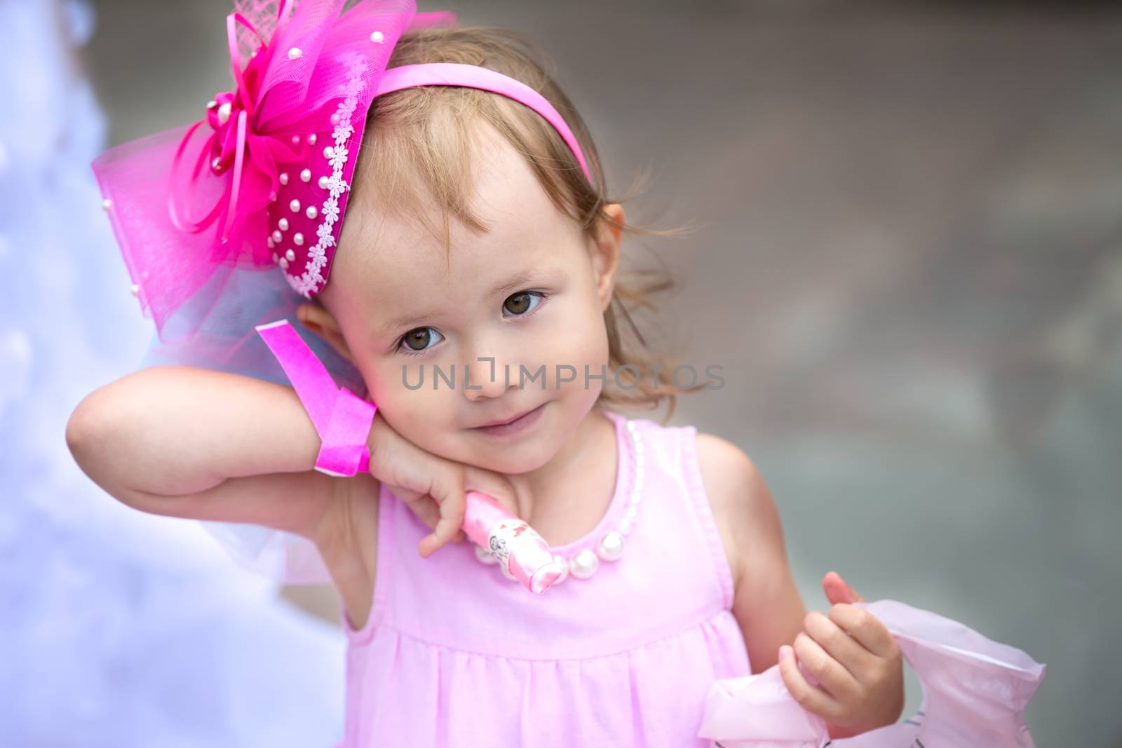 Little girl with a wedding bouquet