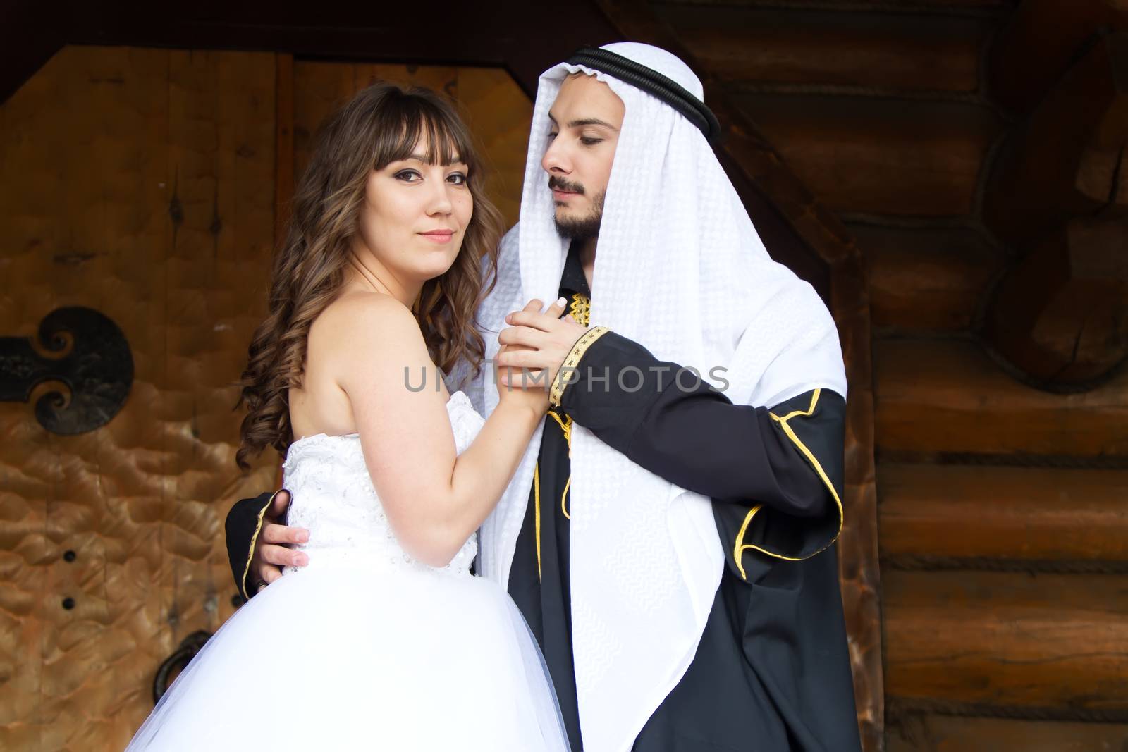 Russia, Moscow, Izmaylovsky Park, August 27, 2017. International Photo Festival.Wedding of an Arab and a Russian woman. Eastern groom and Russian bride