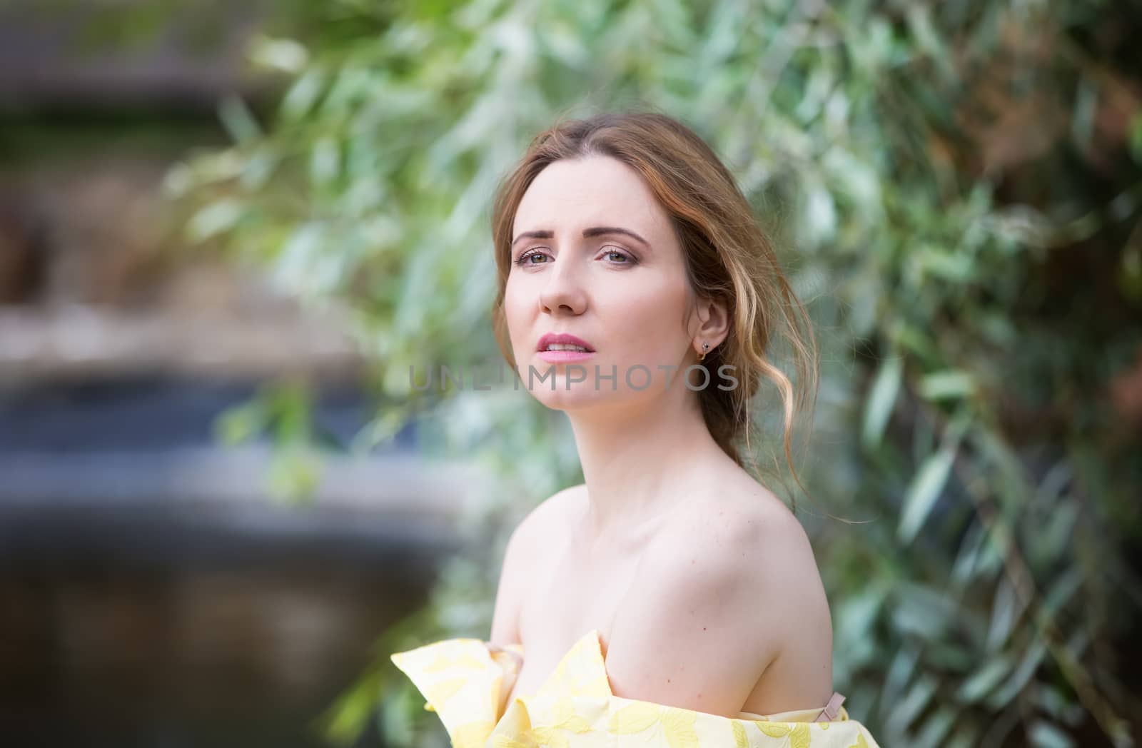 Russia, Moscow, Izmaylovsky Park, August 27, 2017. International Photo Festival.A suffering young woman. Suffering on the face.