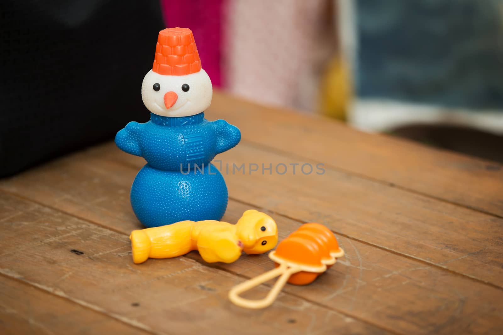 Old Soviet toys are a snowman, a monkey and a rattle. Retro Toys