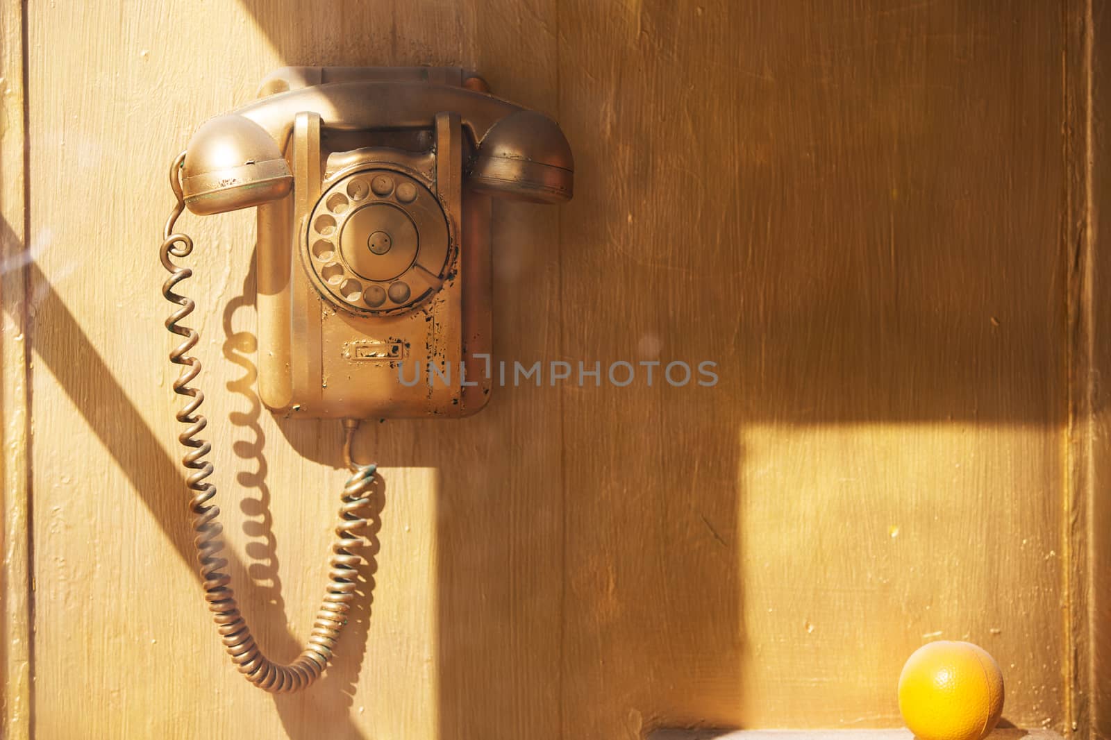 Retro phone in the booth. Telephone in the phone booth