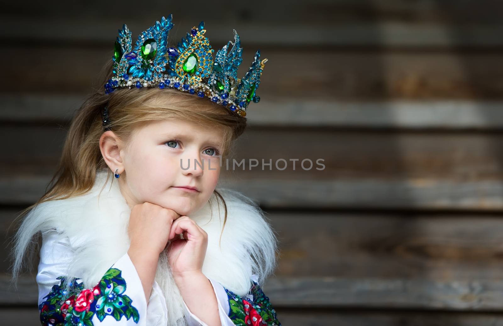 Russia, Moscow, Izmaylovsky Park, August 27, 2017. International Photo Festival.A little Russian queen. The girl in the crown. Queen.