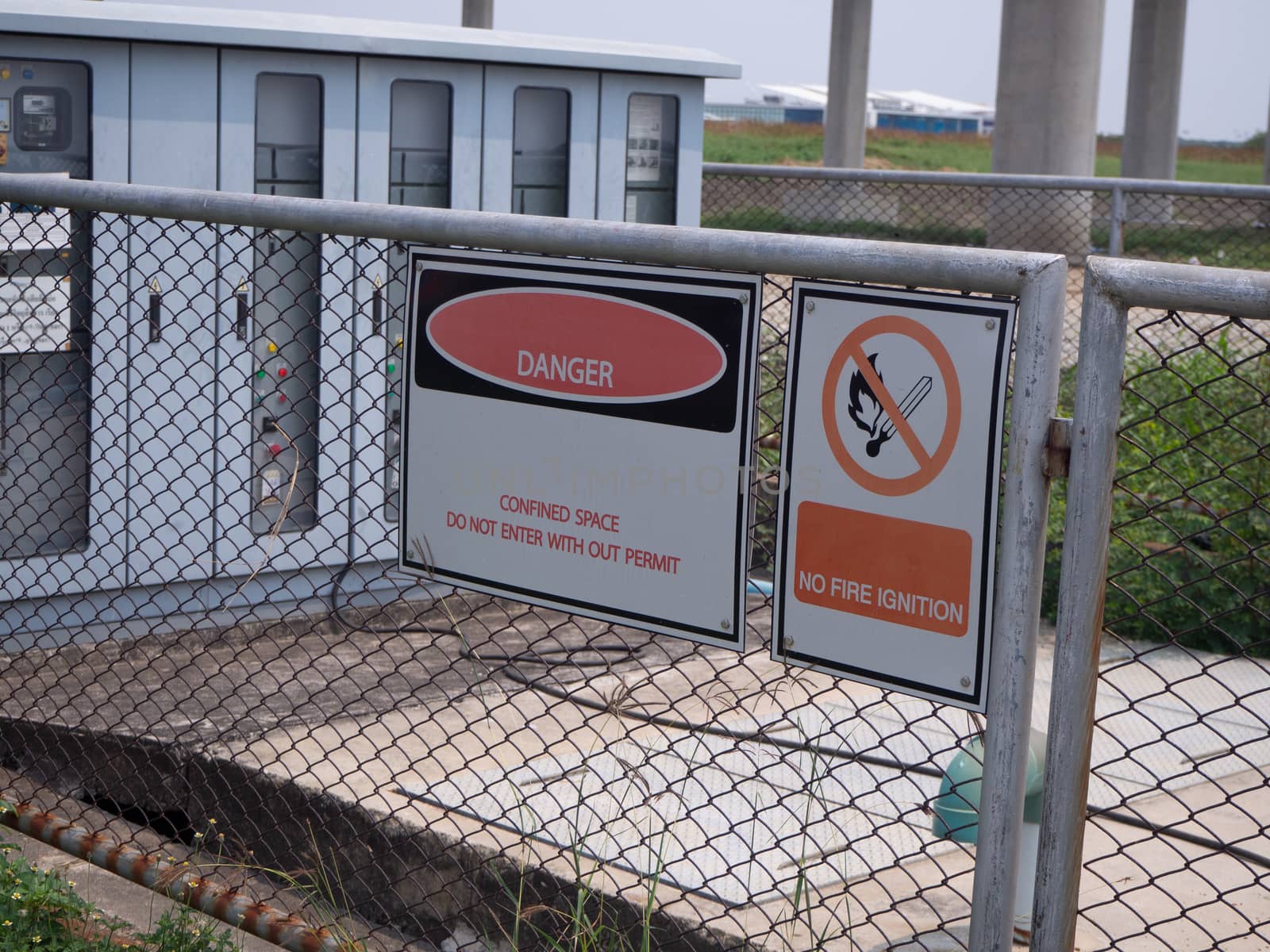 Restricted Area Sign on wire mesh fence
