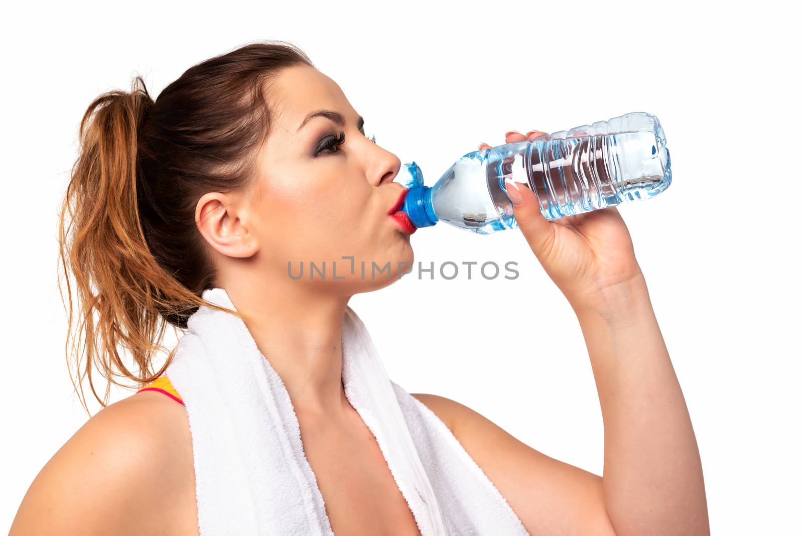 Active woman drinking water by wdnet_studio