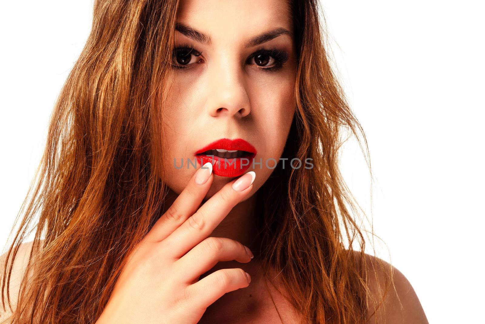 Close up of a beautiful and sensual young woman portrait with long hair and perfect fingernails (vintage effect).