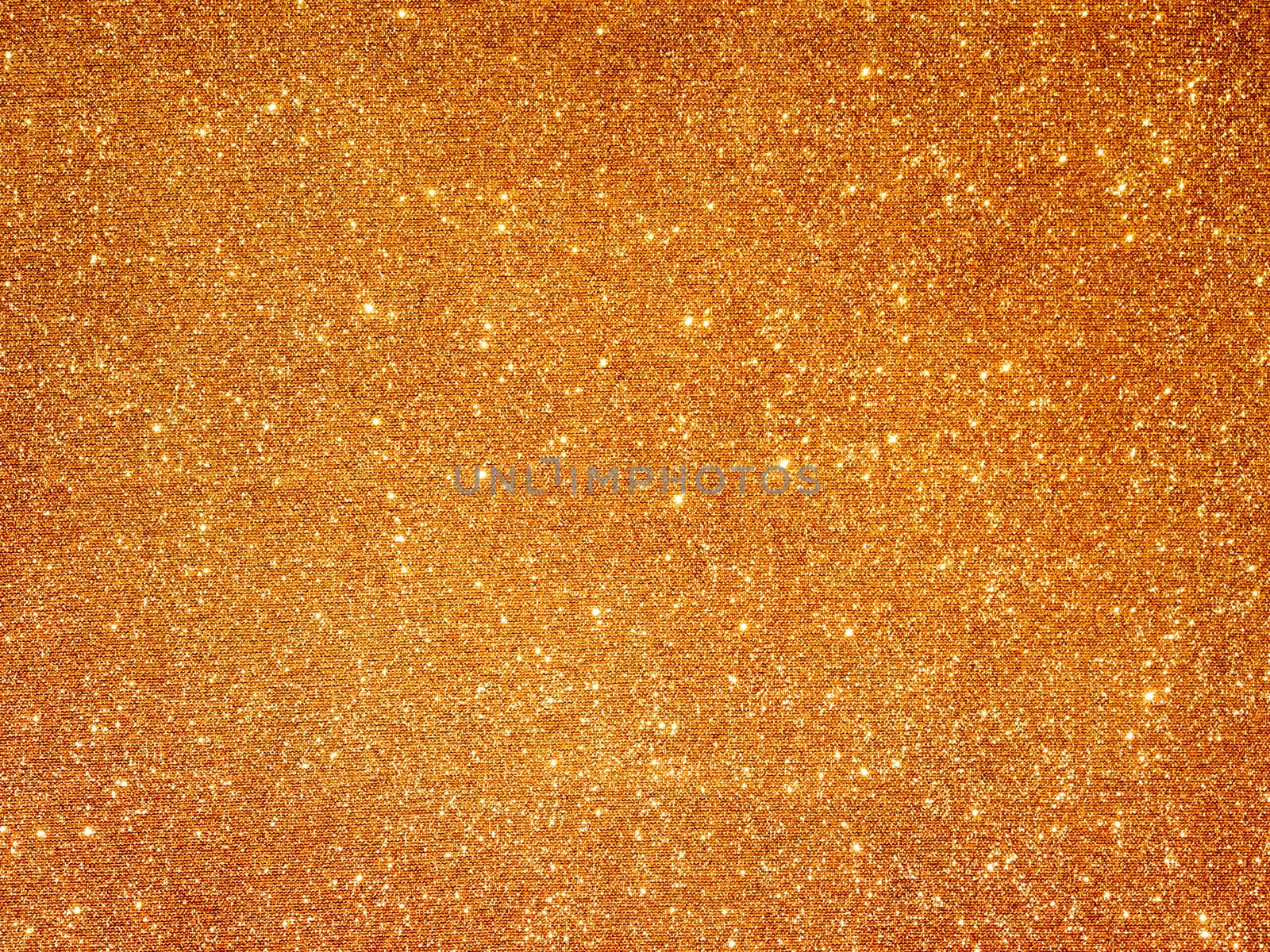 Golden fabric background with light reflections. Perfect luxury holiday background.