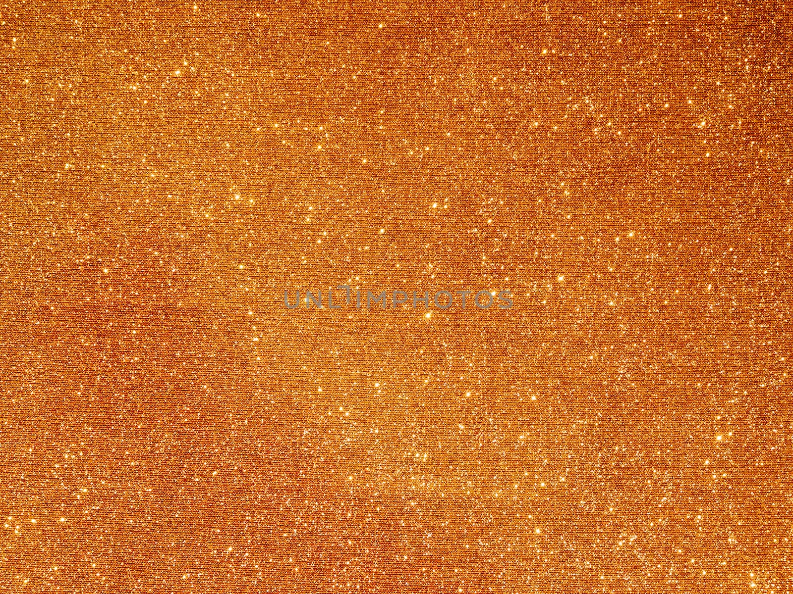 Golden fabric background with light reflections. Perfect luxury holiday background.