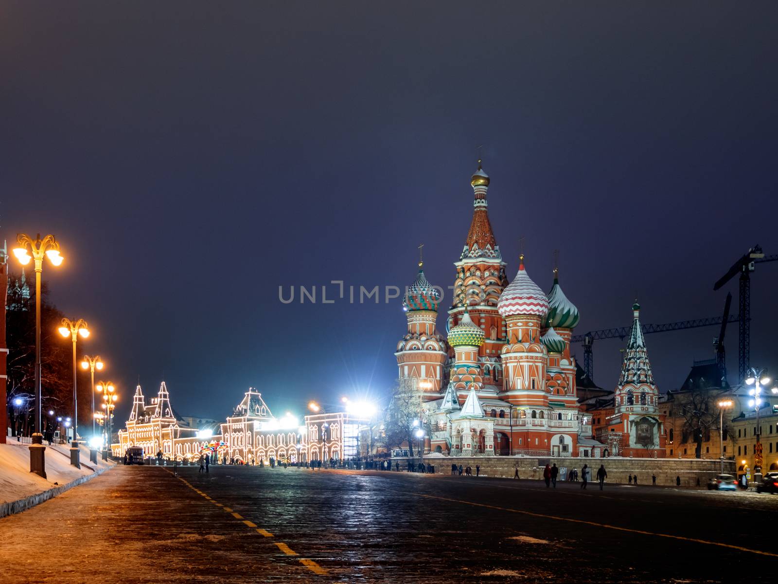 Famous landmarks - St. Basil Cathedral on Red square in Kremlin. Winter evening in Moscow, Russia.