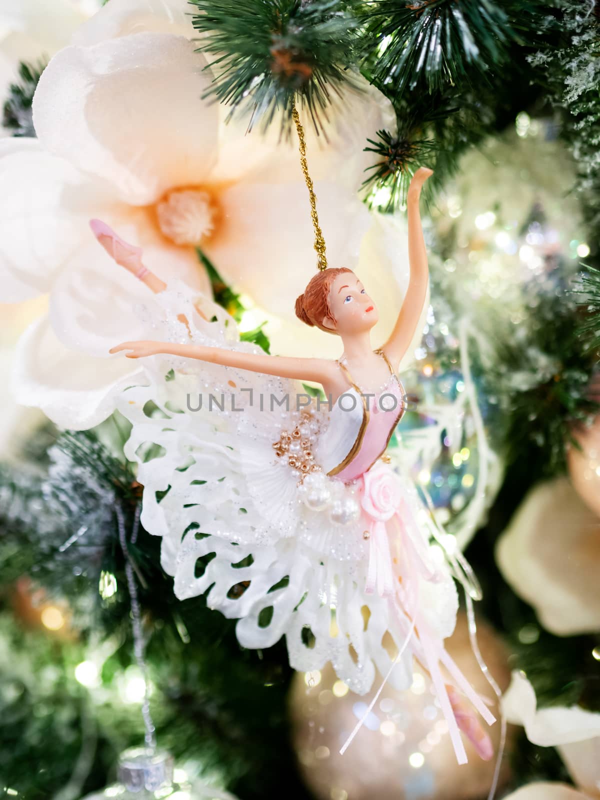 Little graceful ballerina, decorative toy for Christmas tree. Beautiful decoration for New Year celebration. by aksenovko