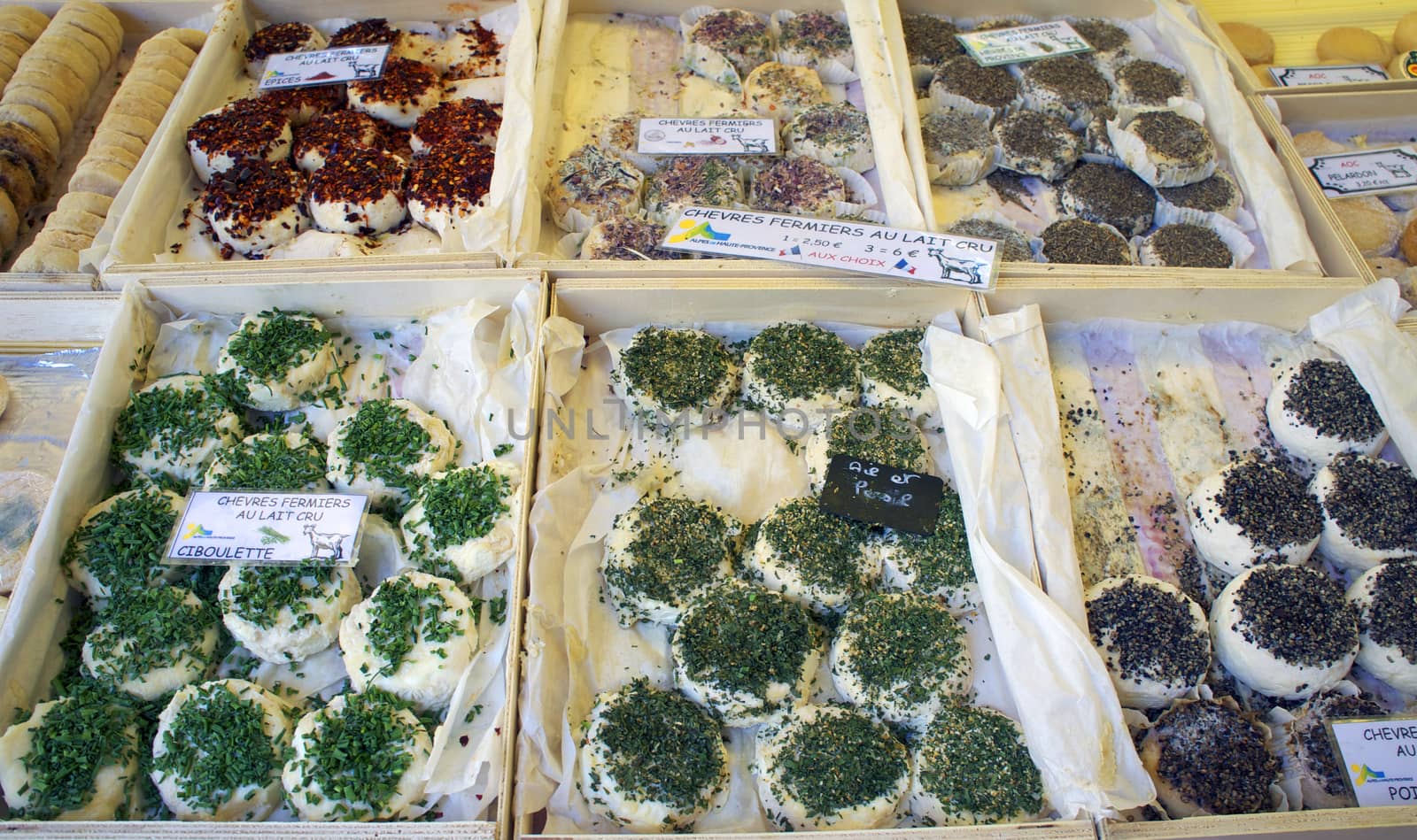 A variety of goat cheeses at an outdoor market located in Aix-en-Provence, a small city in Provence, France