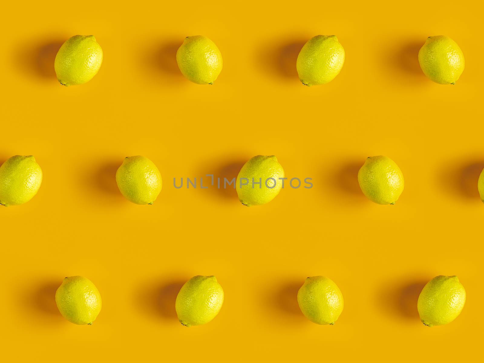 Citrus backdrop. Juicy ripe lemon  pattern on yellow background  by ArtSvitlyna