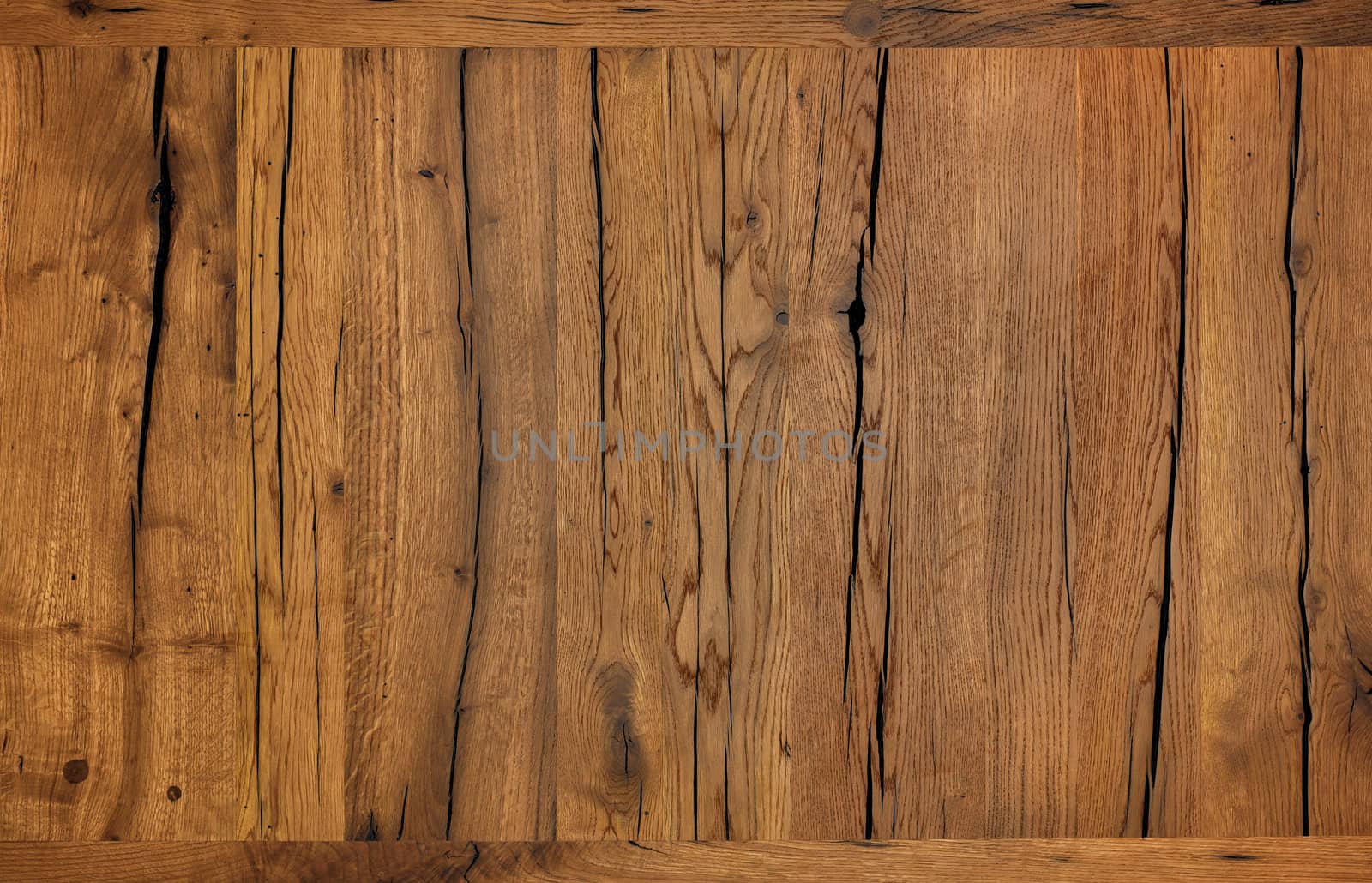 Old, cracked brown wooden background and texture treated with modern protective reagents and wax, high resolution.