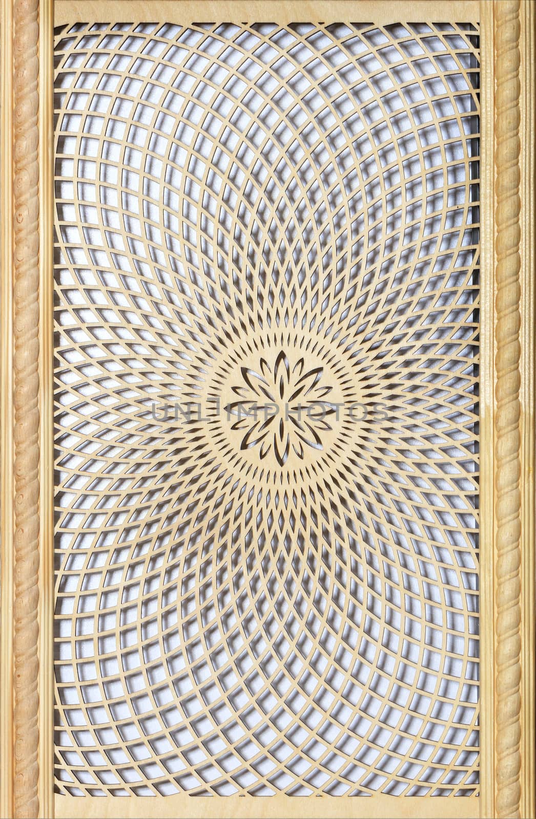 Wooden threaded figured panel with a pattern in the form of concentric circles around the center of the oriental style. Wood wall art, for wall decoration.