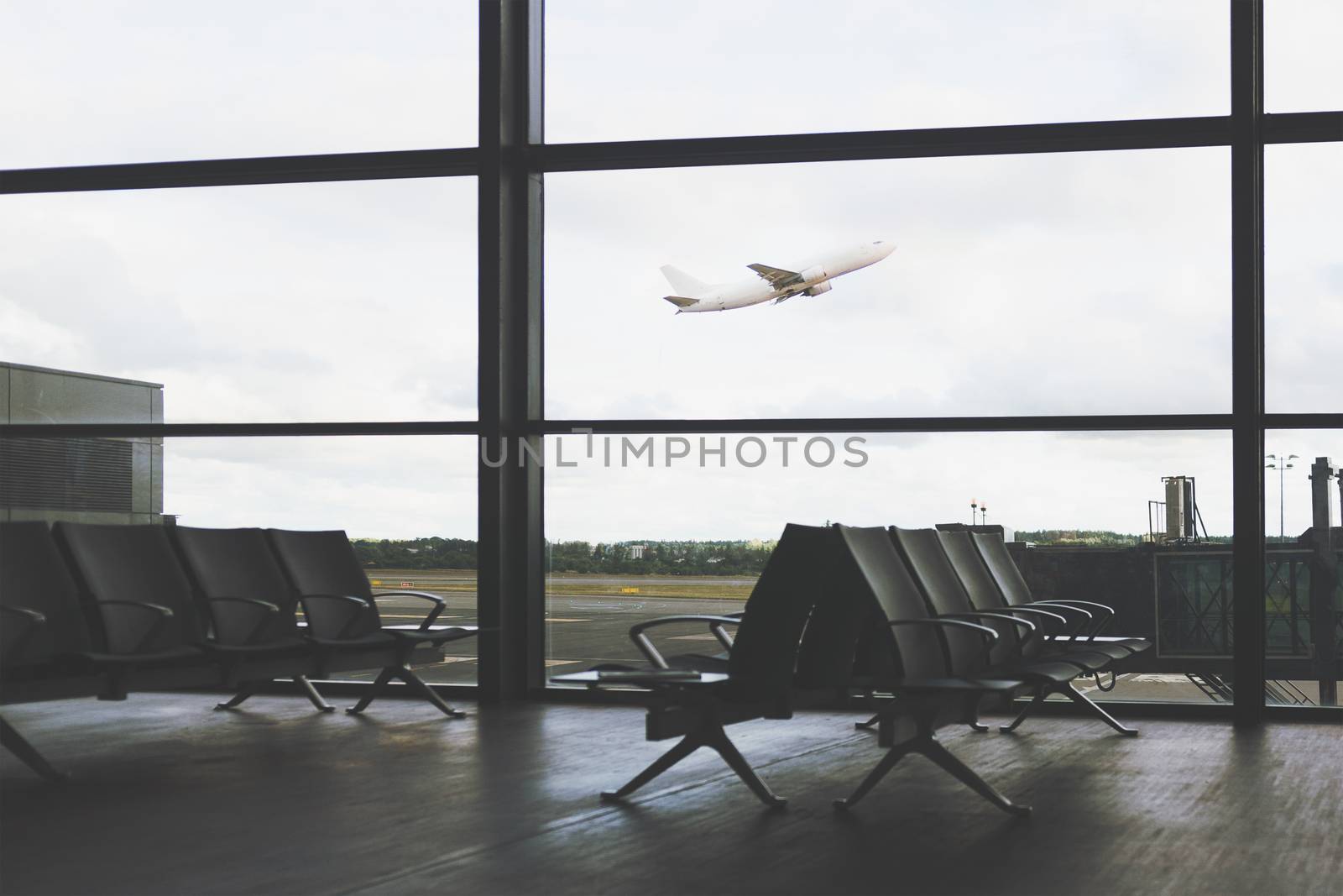 Plane takes off at the airport by wdnet_studio