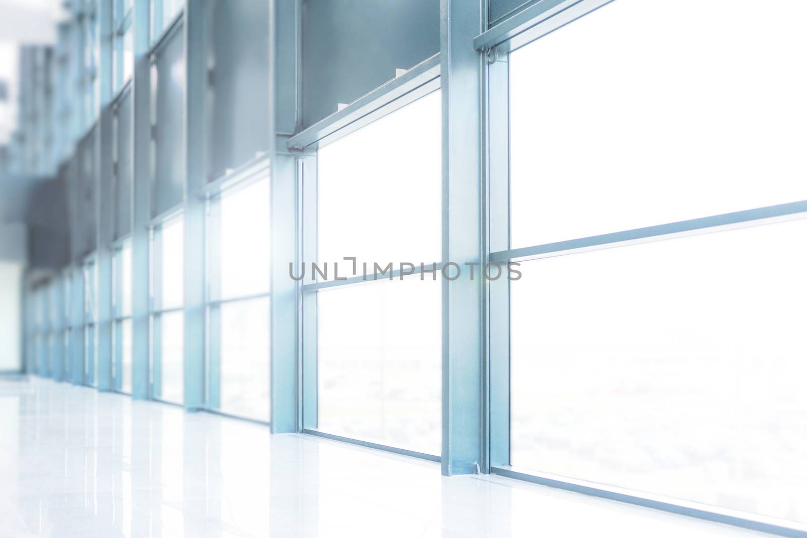 Modern interior architecture - corporate or hospital building abstract background (blue filter) 