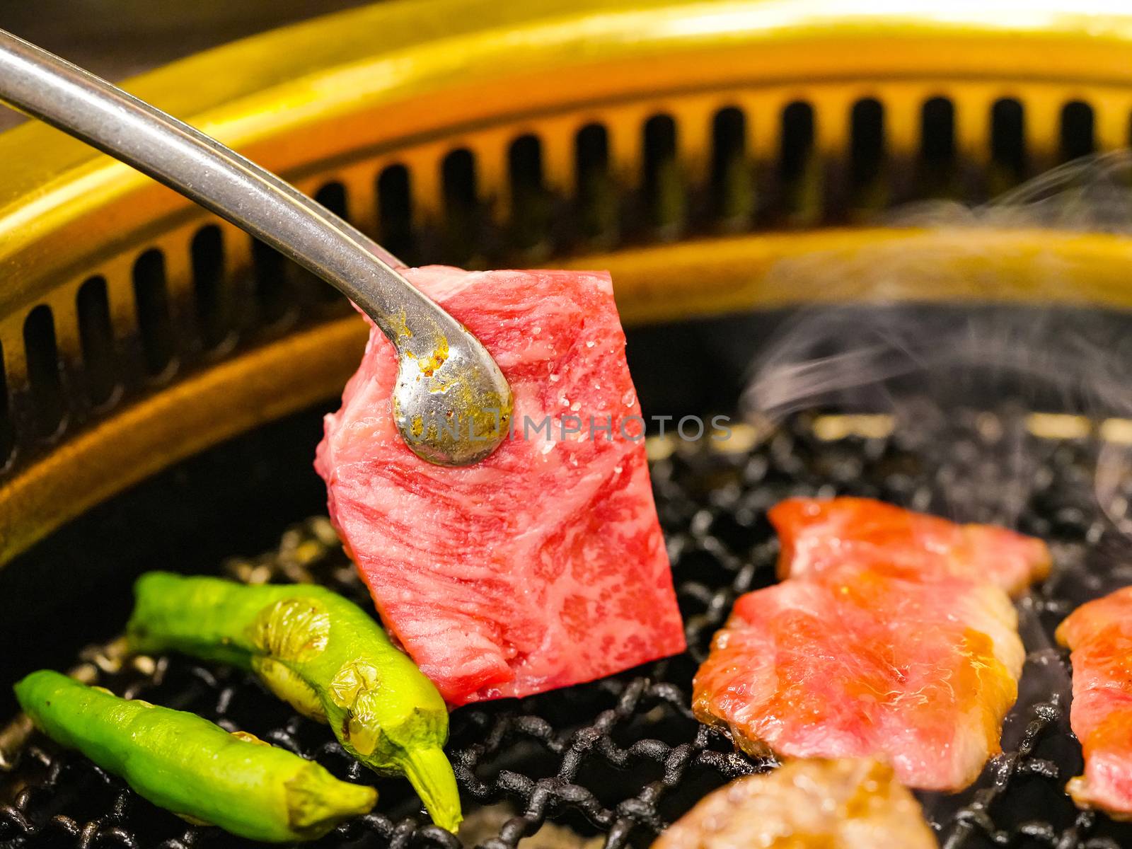 Matsusaka beef grilling on griddle pan. Matsusaka City, Japan. (Japan's Most Expensive Beef)
