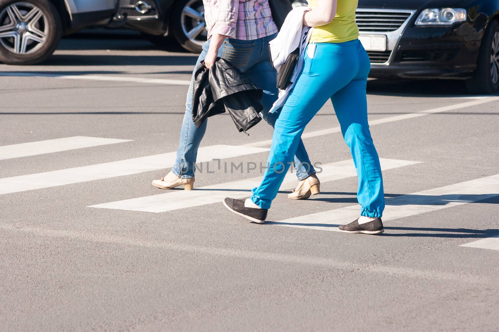 pedestrians walking on a crosswalk by raddnatt