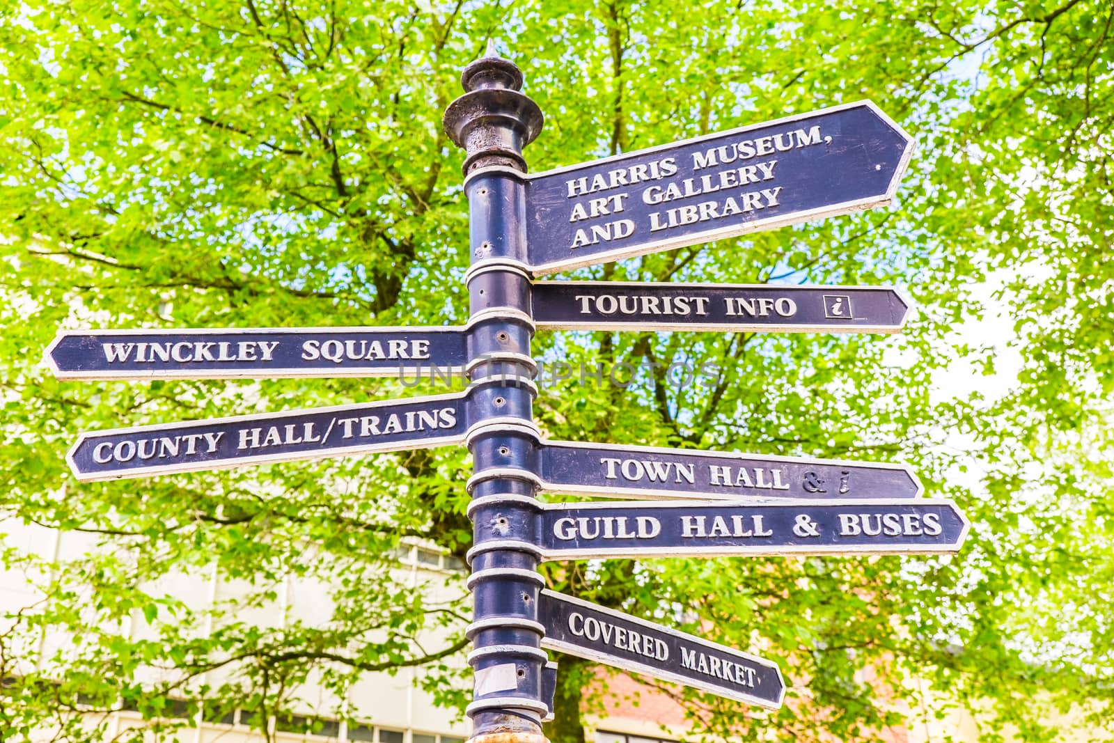 Town signpost showing directions to various places in the center of historical City of Preston by paddythegolfer