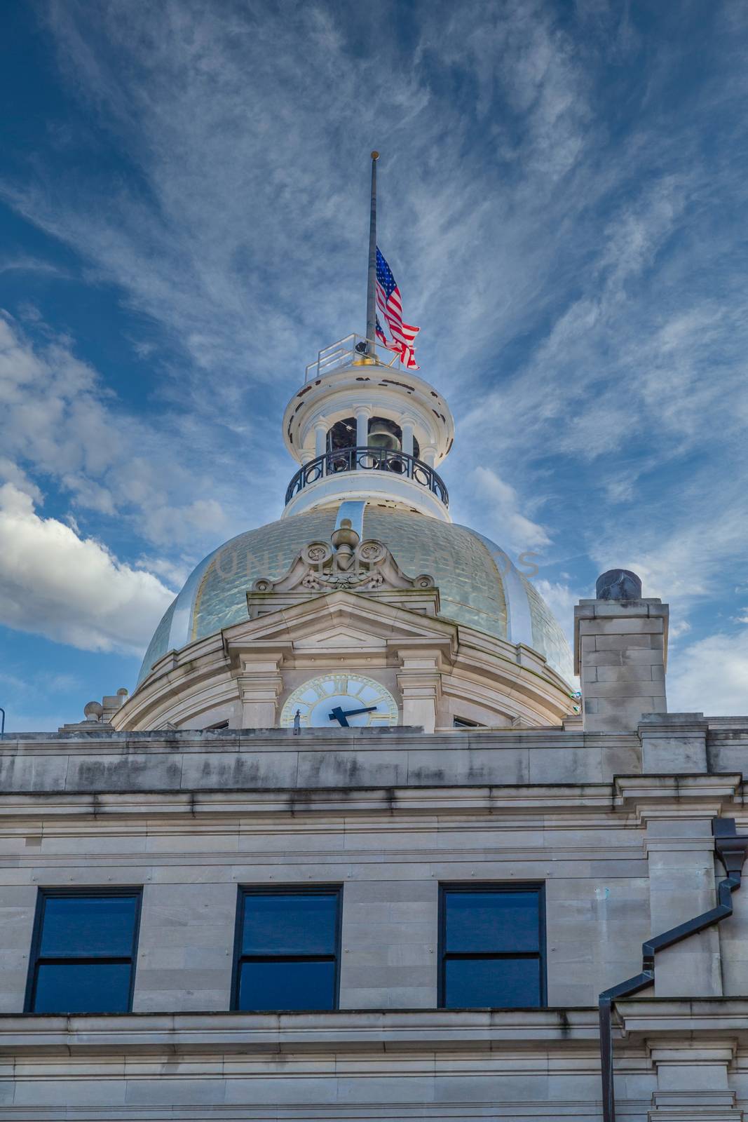 Dome clock and flag on Old Savannah City Hall