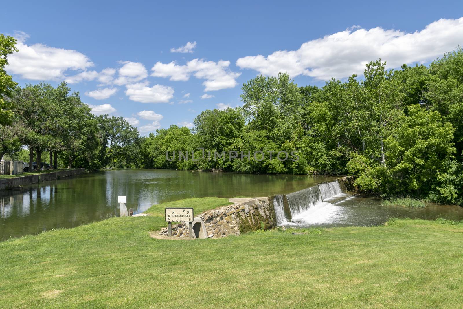 Amish Countryside with a Man Made Waterfall by a Mill