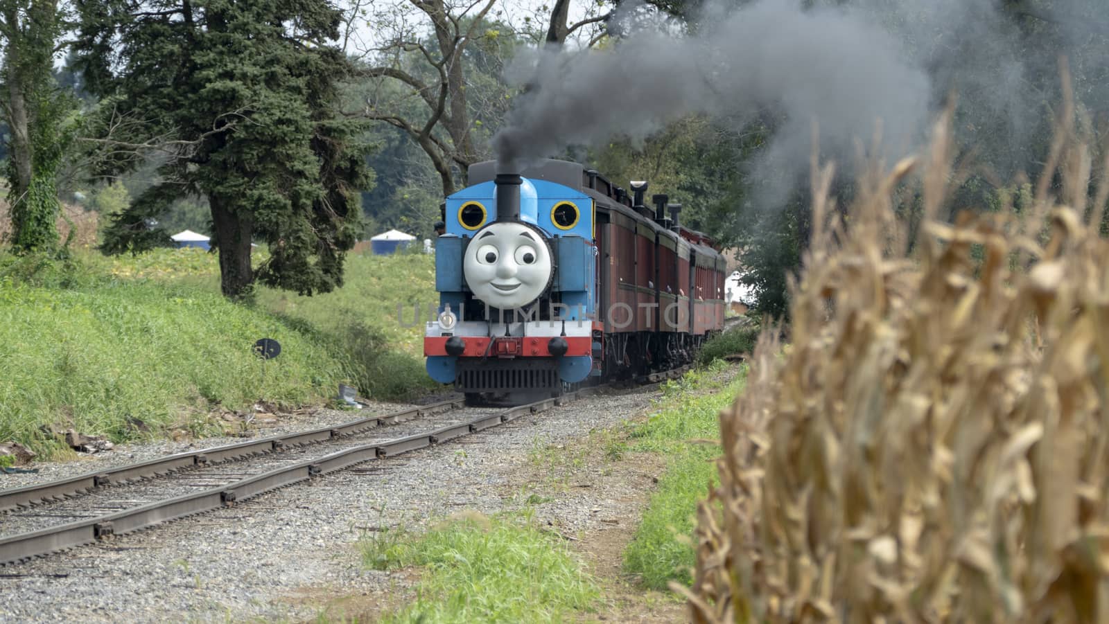 Strasburg, Pennsylvania - September 2018: Thomas the Train in Amish Countryside Puffing Away