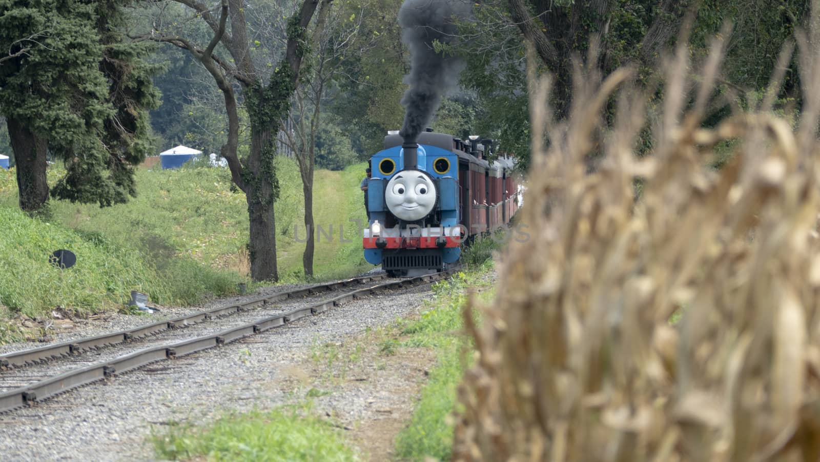 Strasburg, Pennsylvania - September 2018: Thomas the Train in Amish Countryside Puffing Away