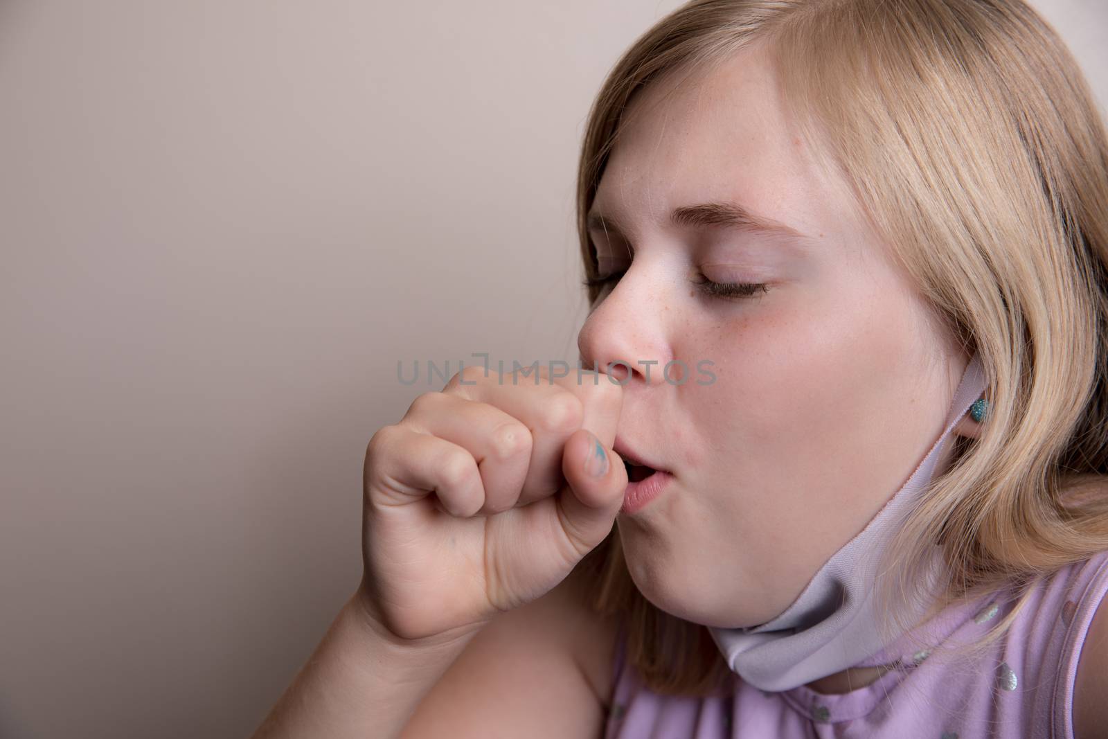 unsafe action of removing face mask to cough