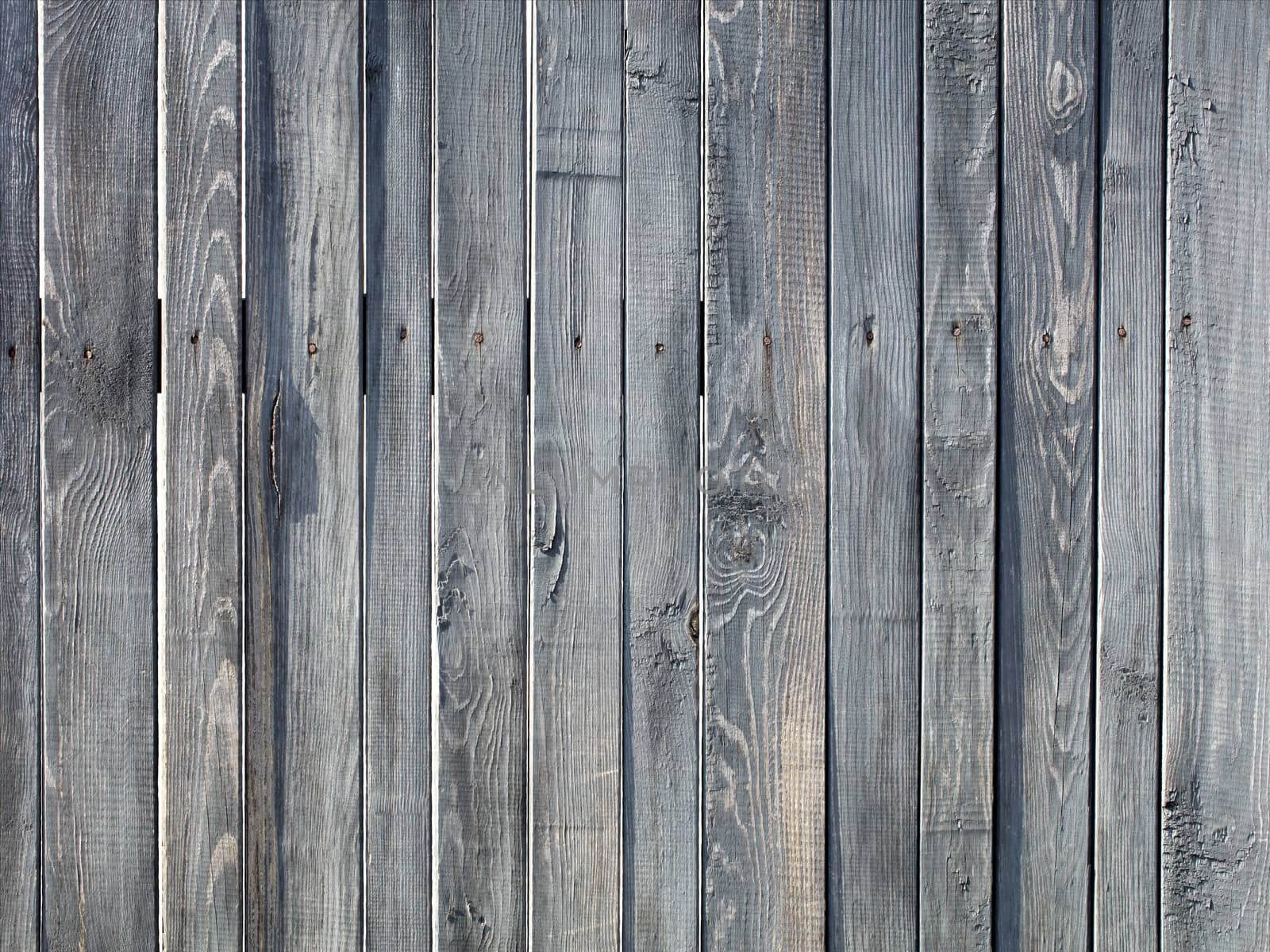 Weathered old gray wooden fence by Sergii