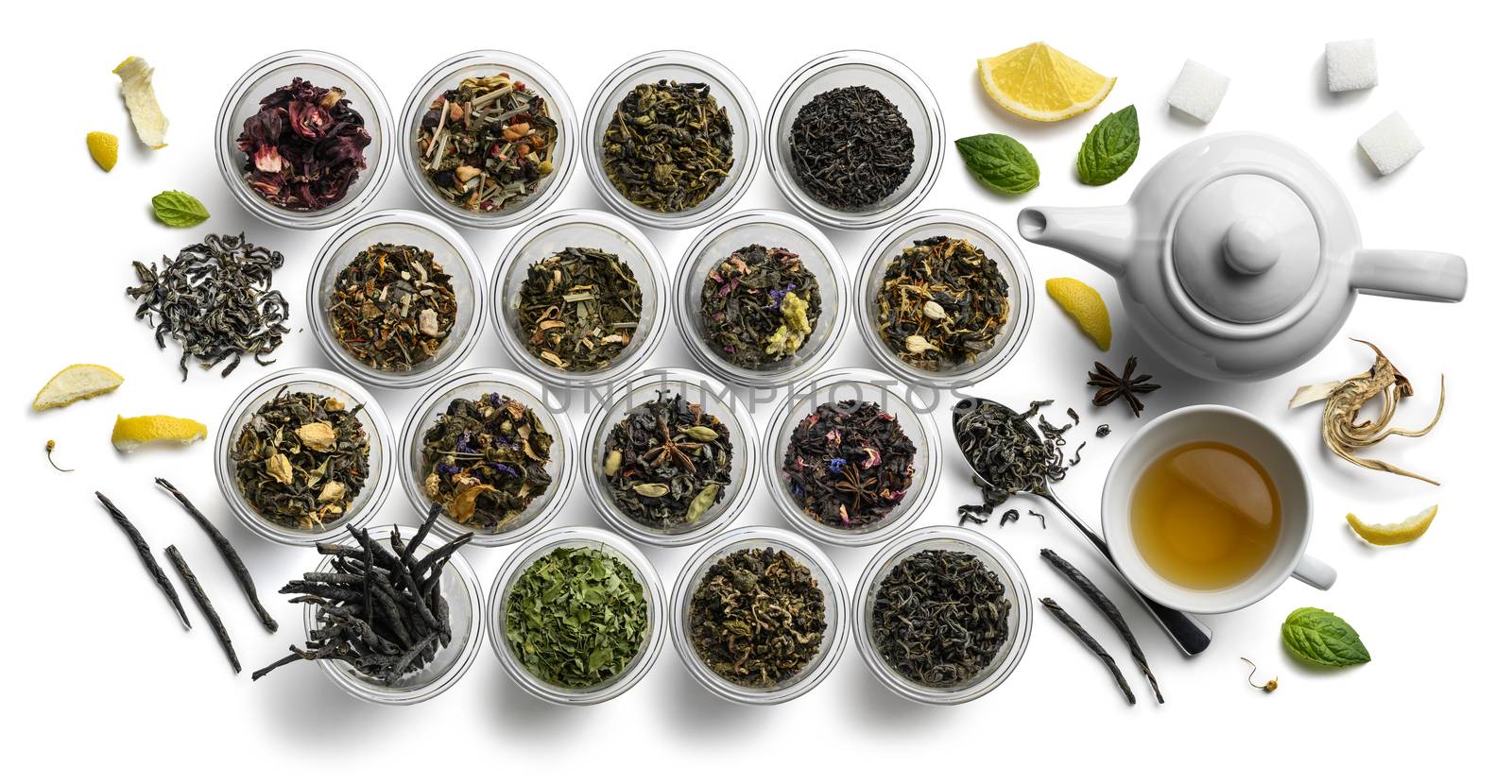 Large assortment of tea on a white background. The view from the top.