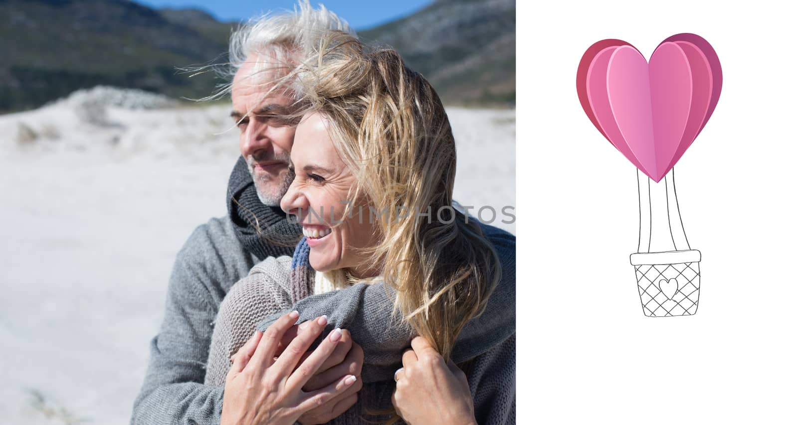 Composite image of carefree couple hugging on the beach in warm clothing by Wavebreakmedia
