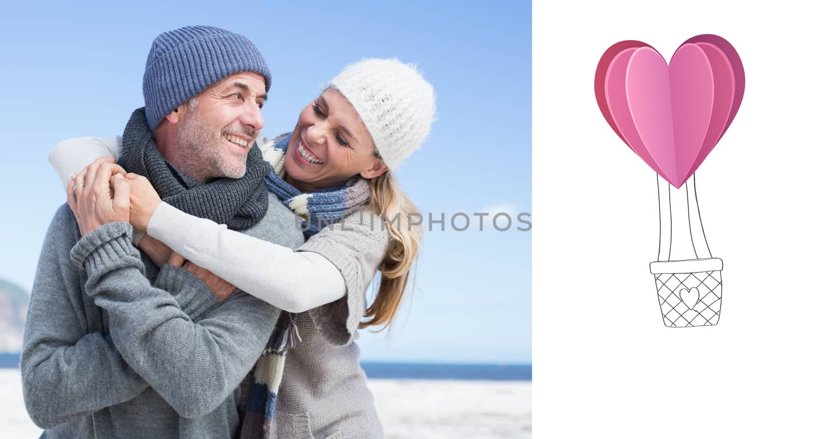 Composite image of attractive couple hugging on the beach in warm clothing by Wavebreakmedia