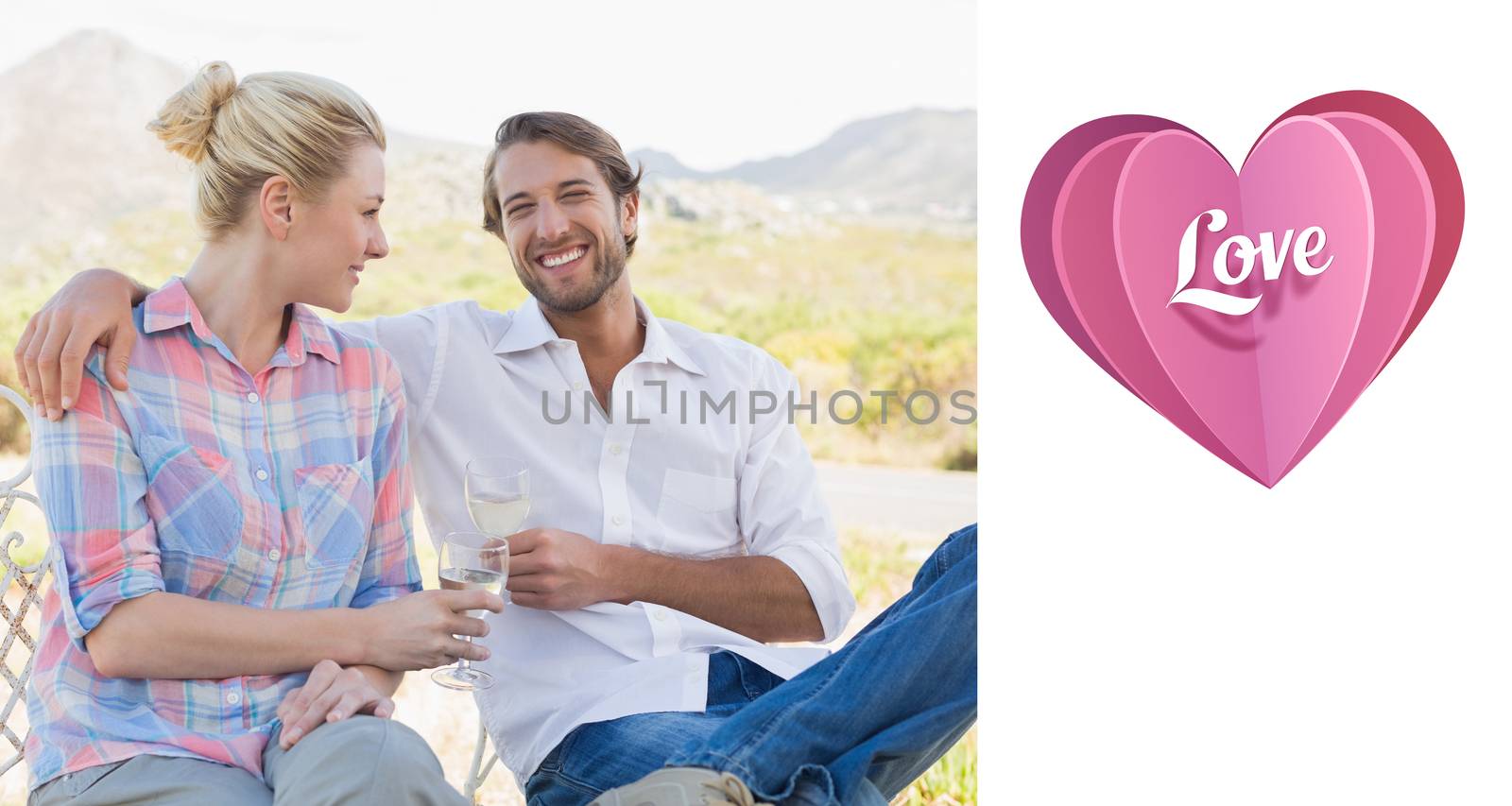 Cute couple sitting in the garden enjoying wine together against love heart