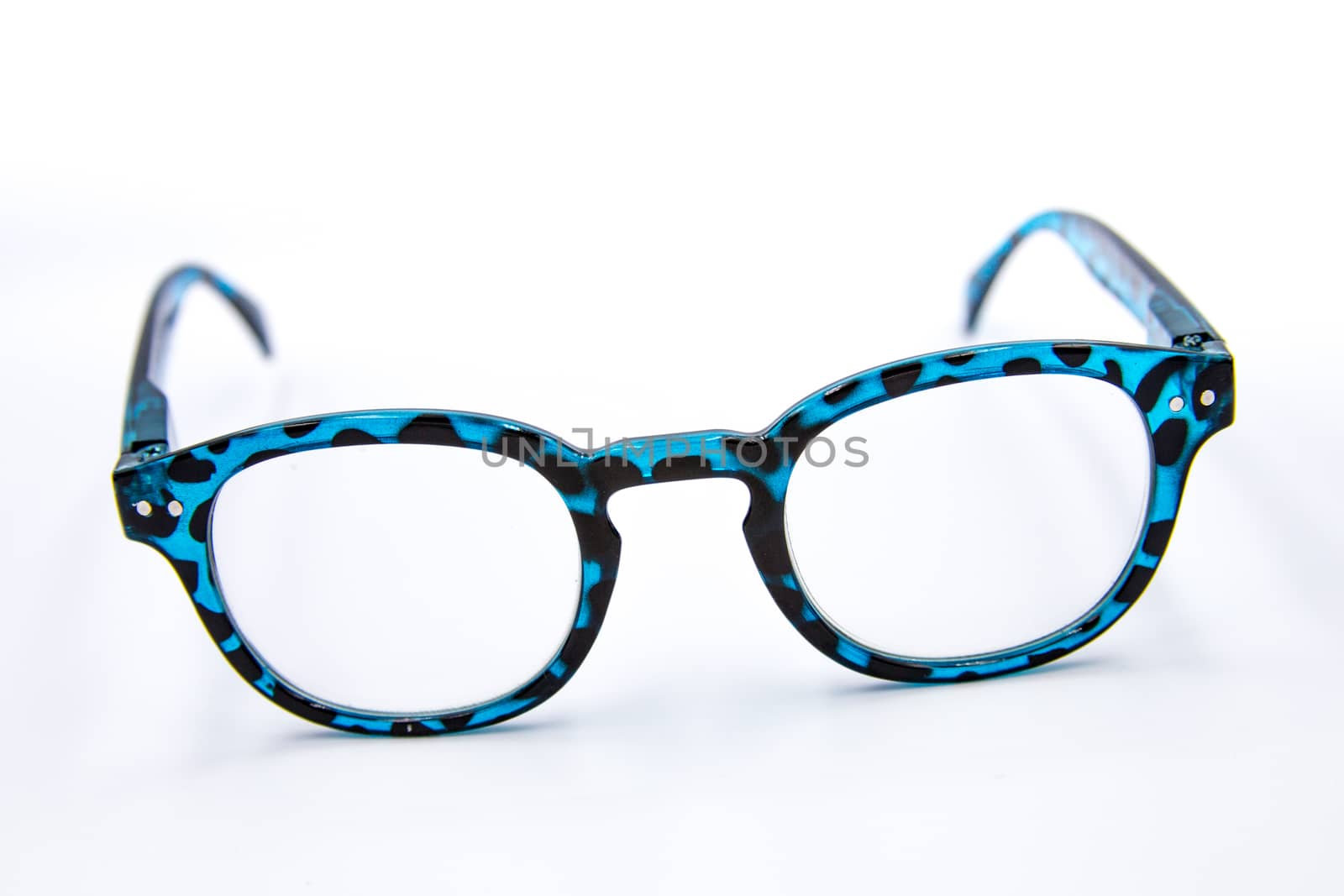 Blue-black eyeglasses strap on the white ground.