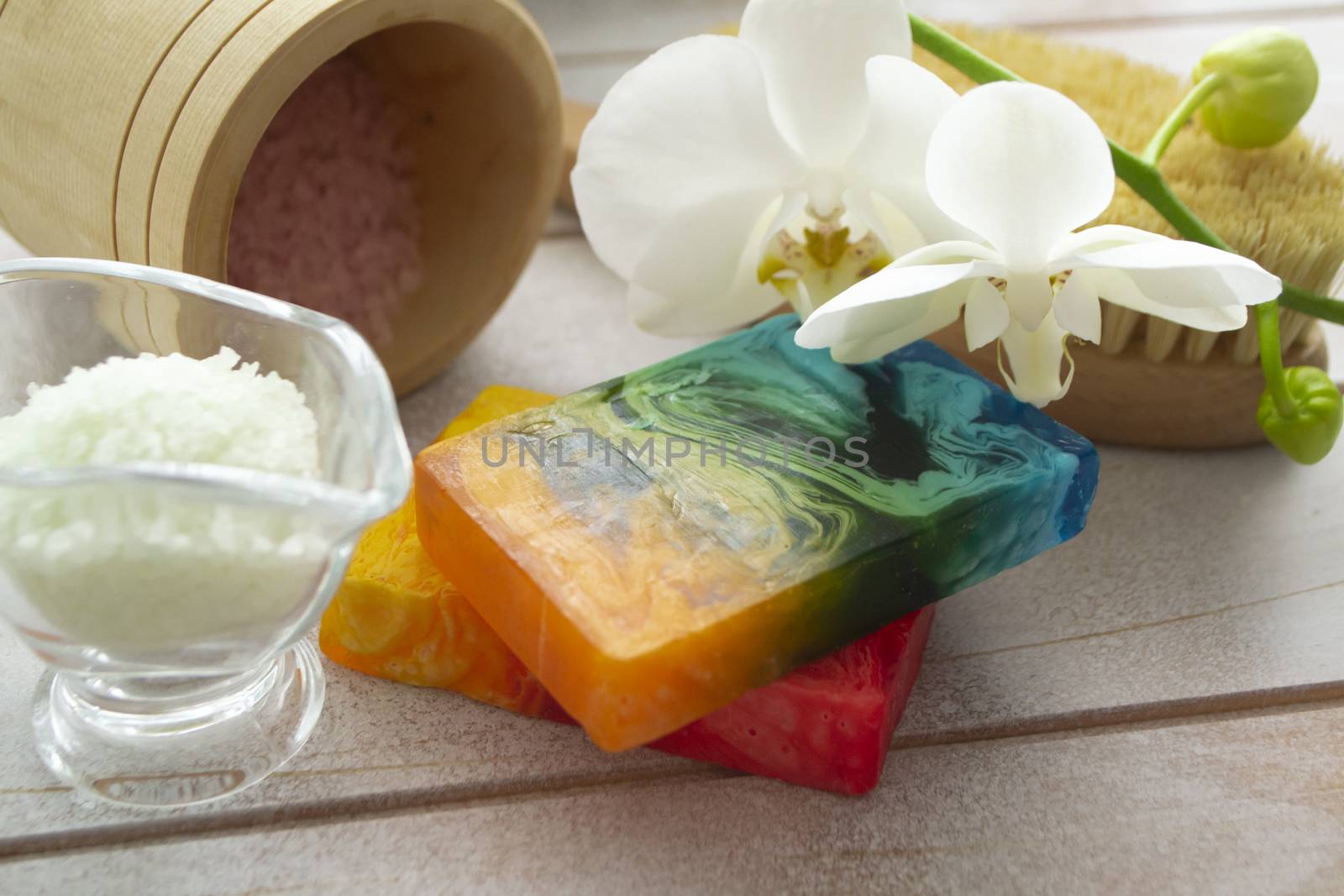 Dead sea salt and homemade soap, wellness and relaxation. Orchid flower