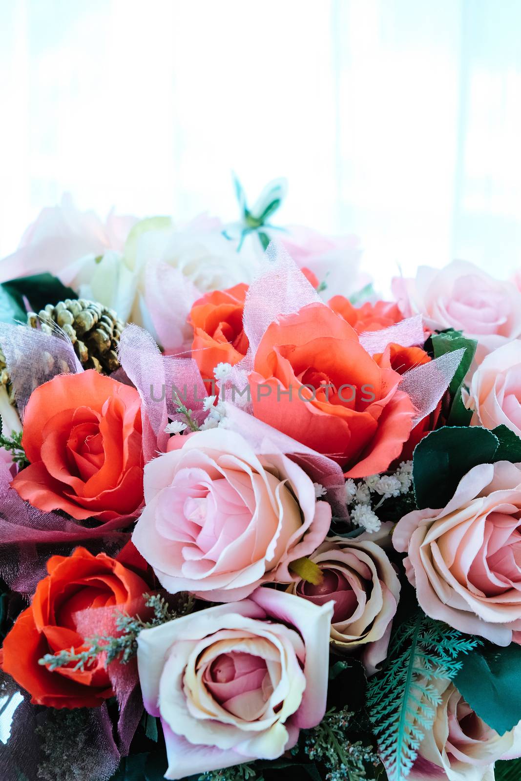 Floral background. artificial flowers in a colorful