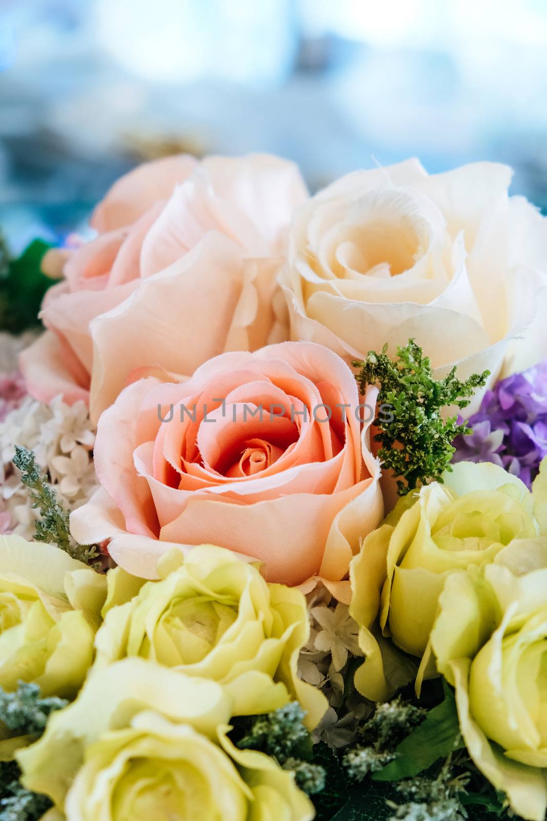 Floral background. artificial flowers in a colorful